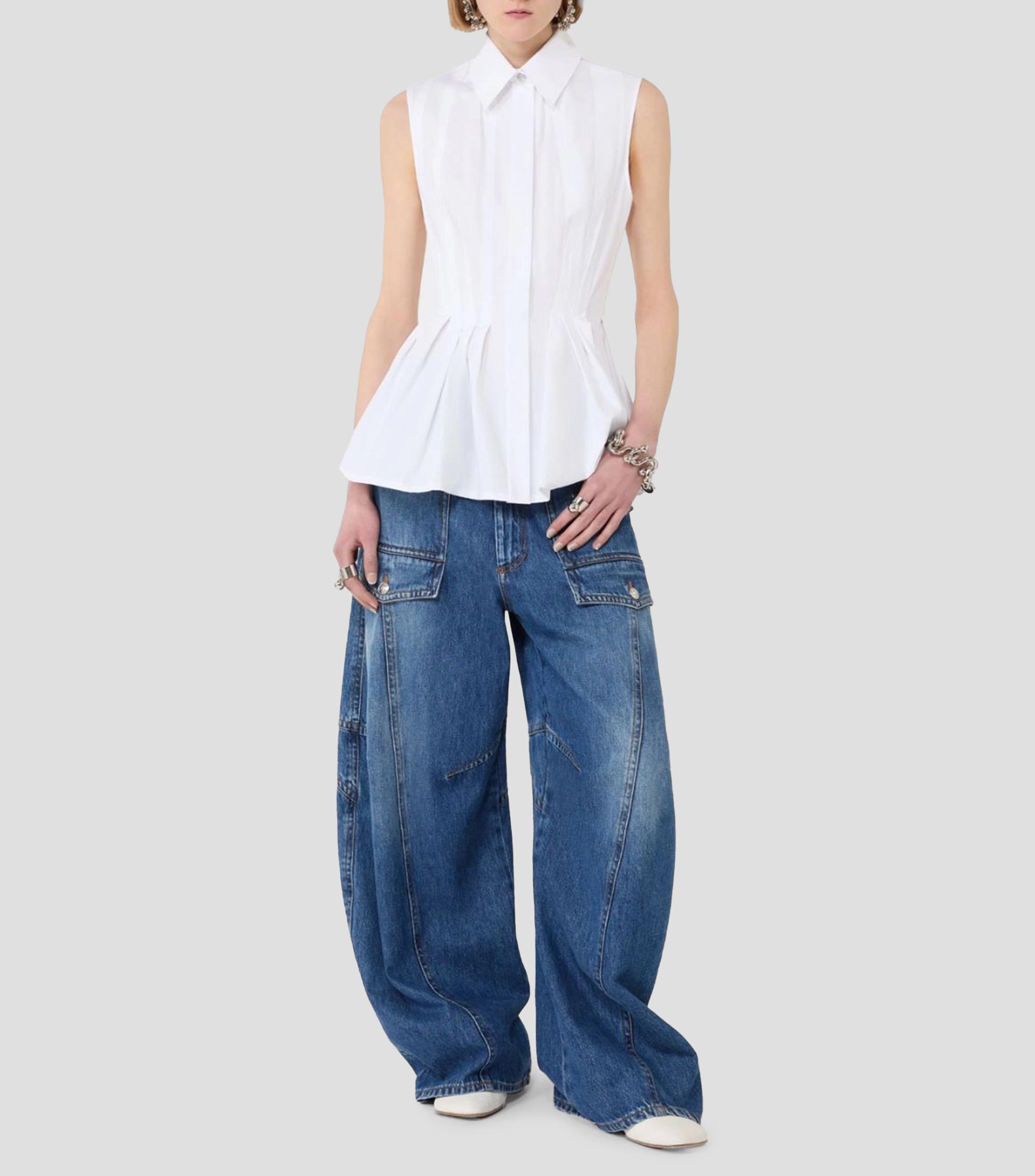 Camisa lisa sin mangas Mujer