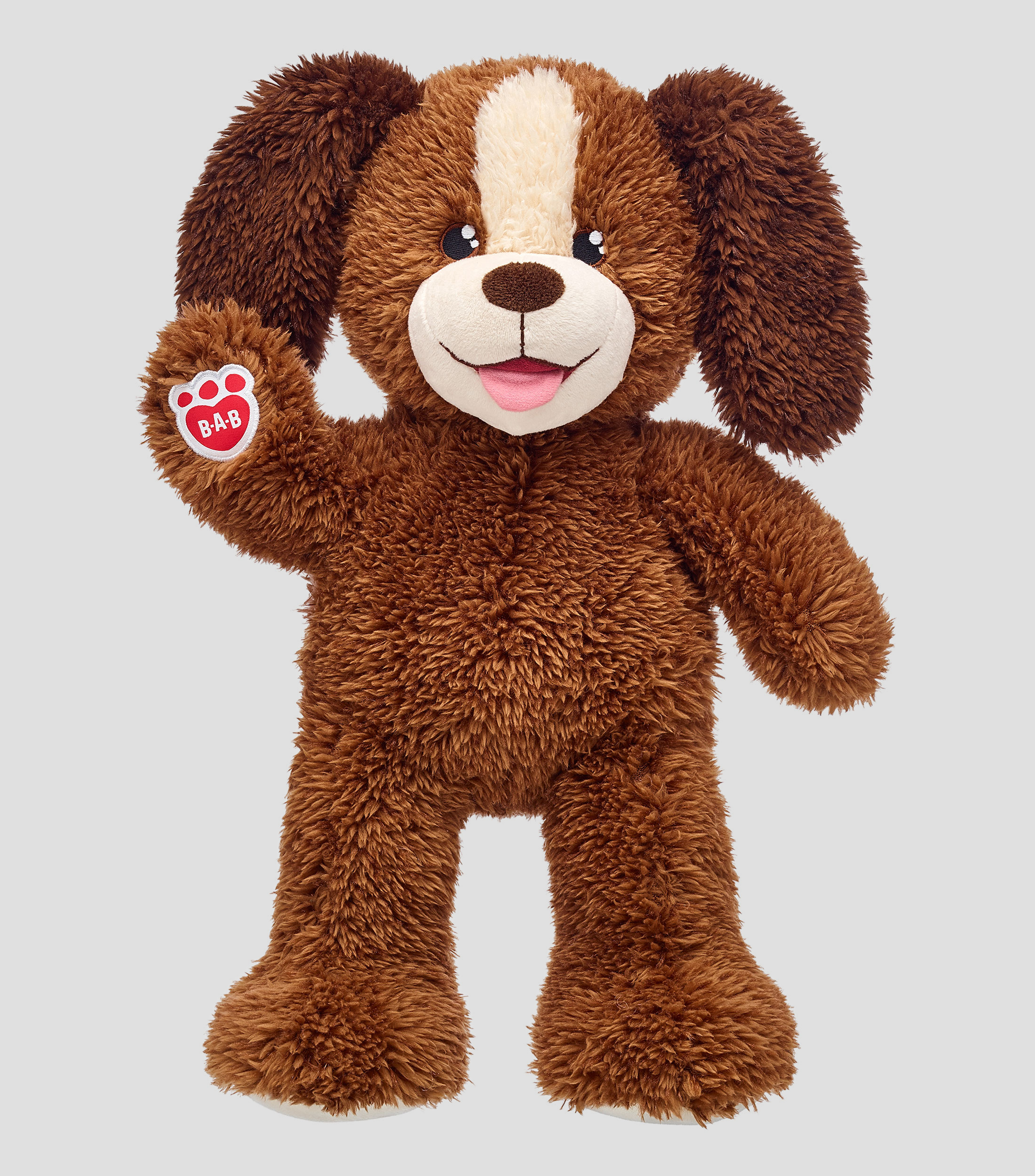 Perro cachorro de peluche