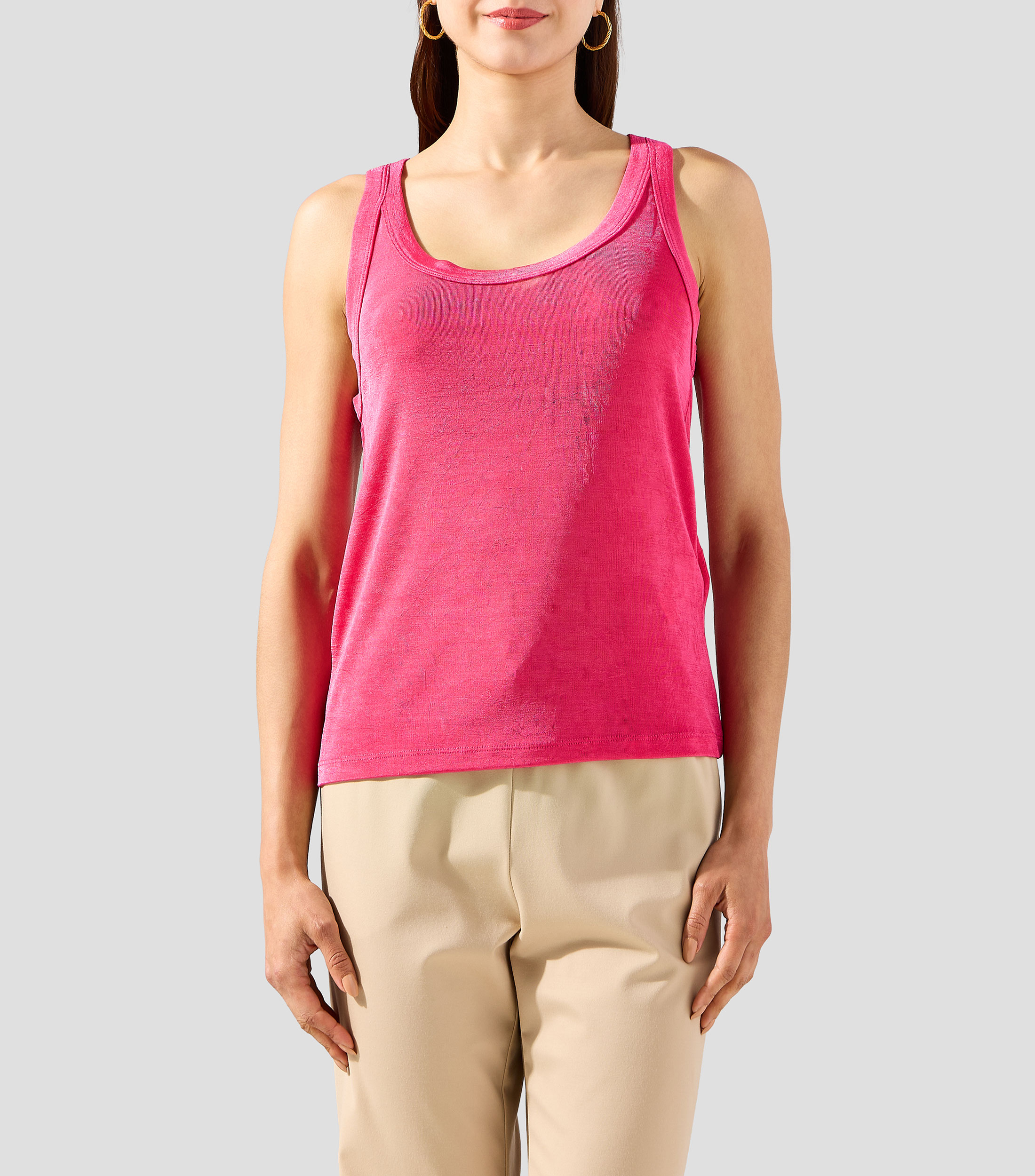 Blusa lisa sin mangas Mujer