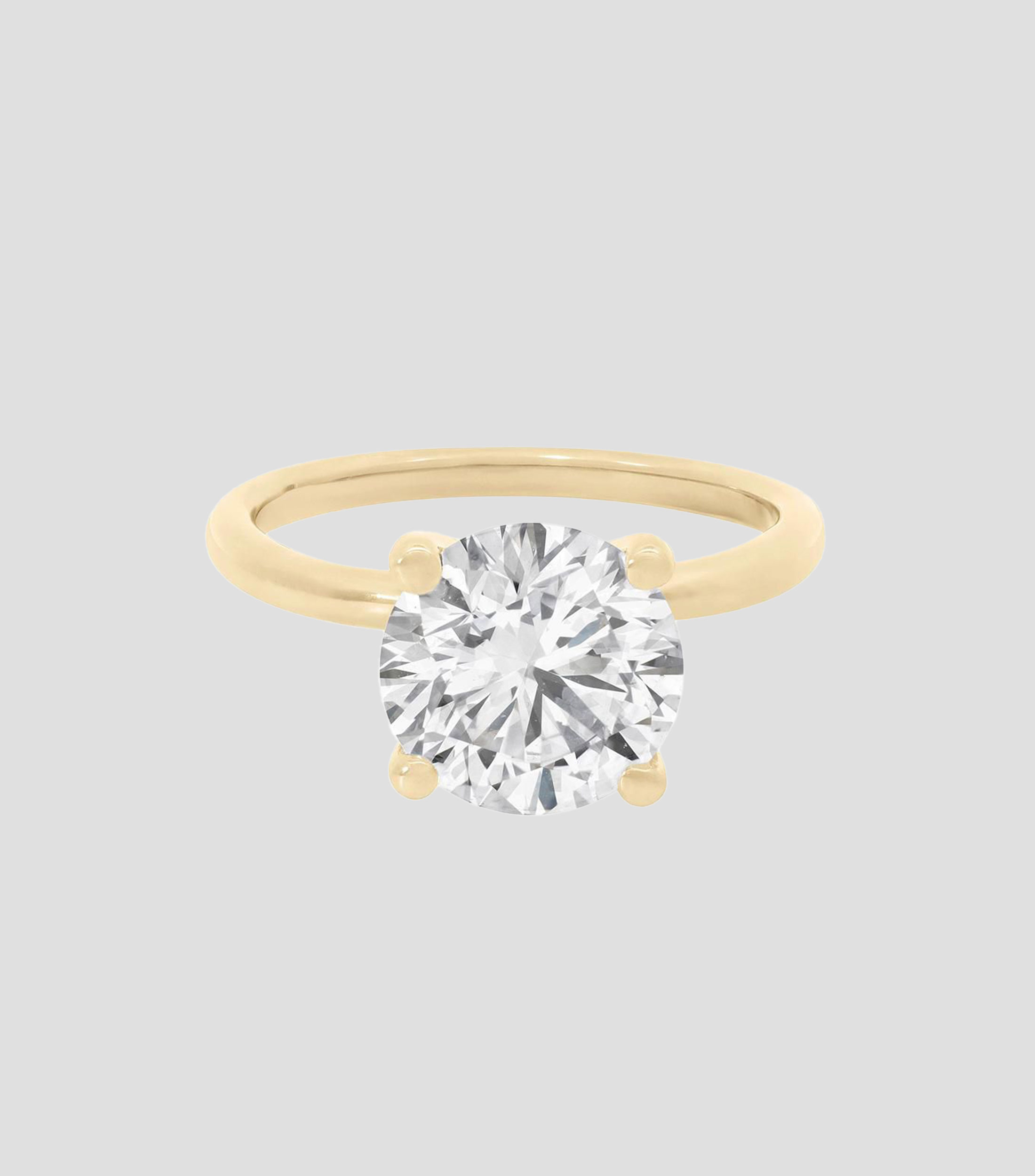 Anillo solitario en oro de 14 kilates Mujer