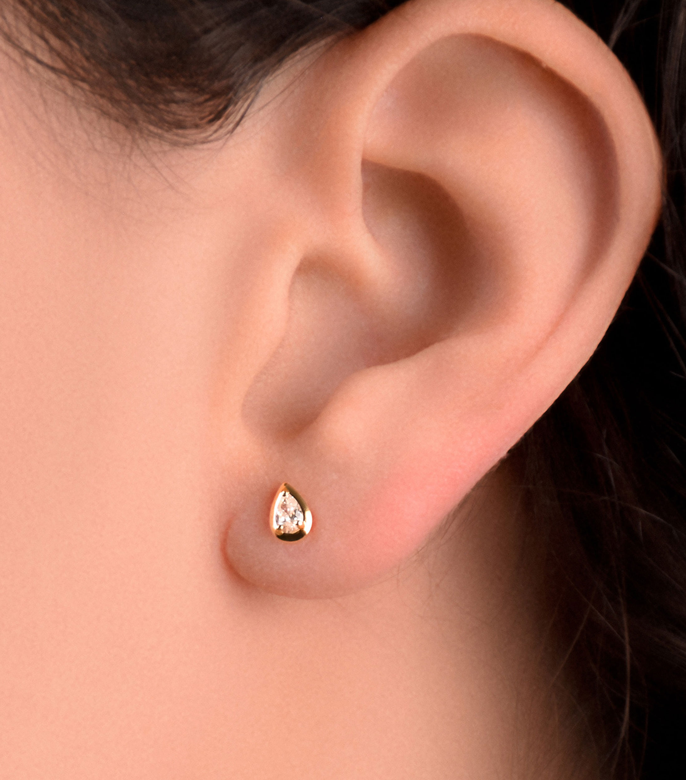 Broqueles en Oro amarillo de 18 Kilates con Diamante Mujer