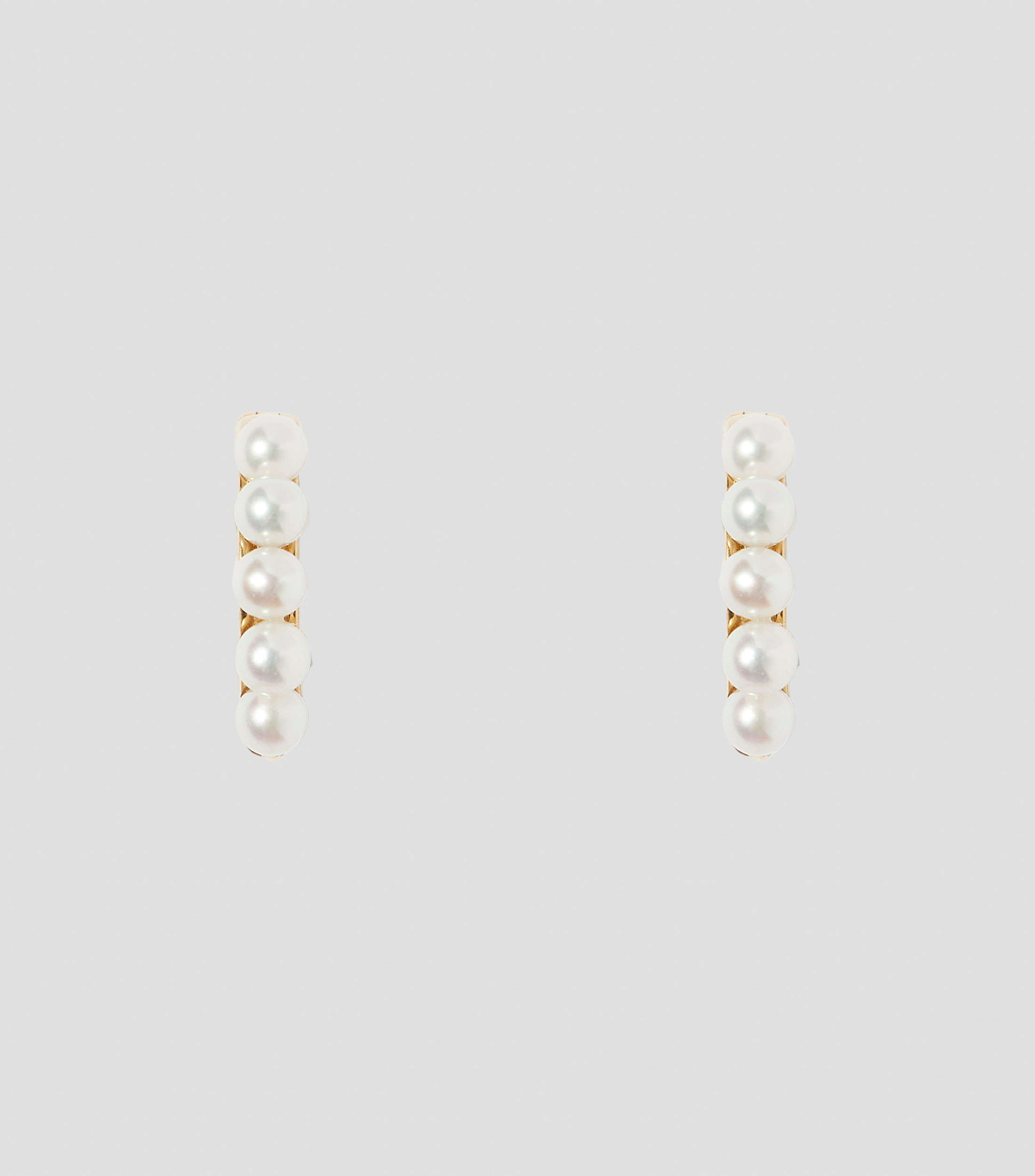 Aretes en oro amarillo de 14 kilates con perlas Mujer