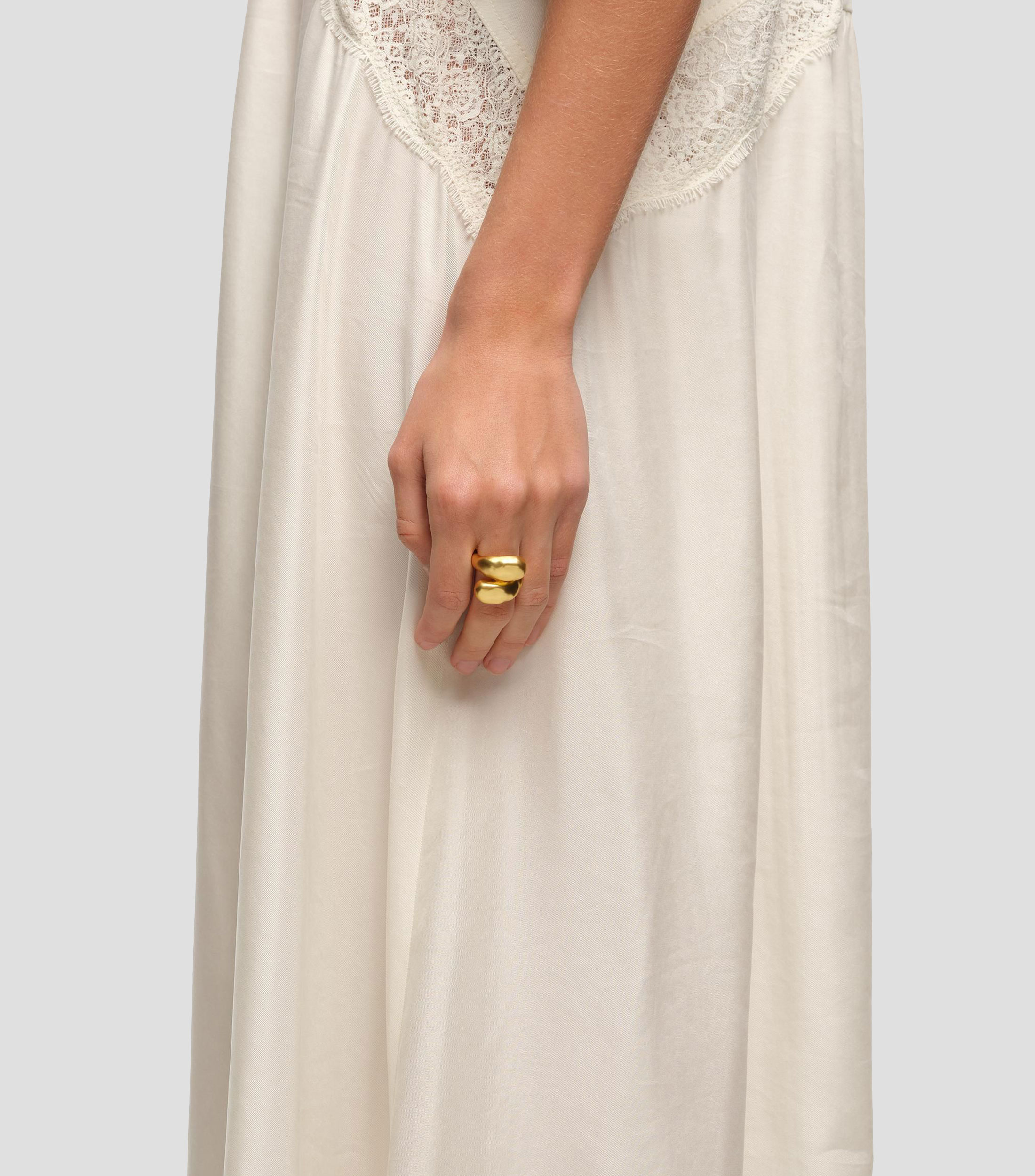 Anillo cruzado con textura Mujer