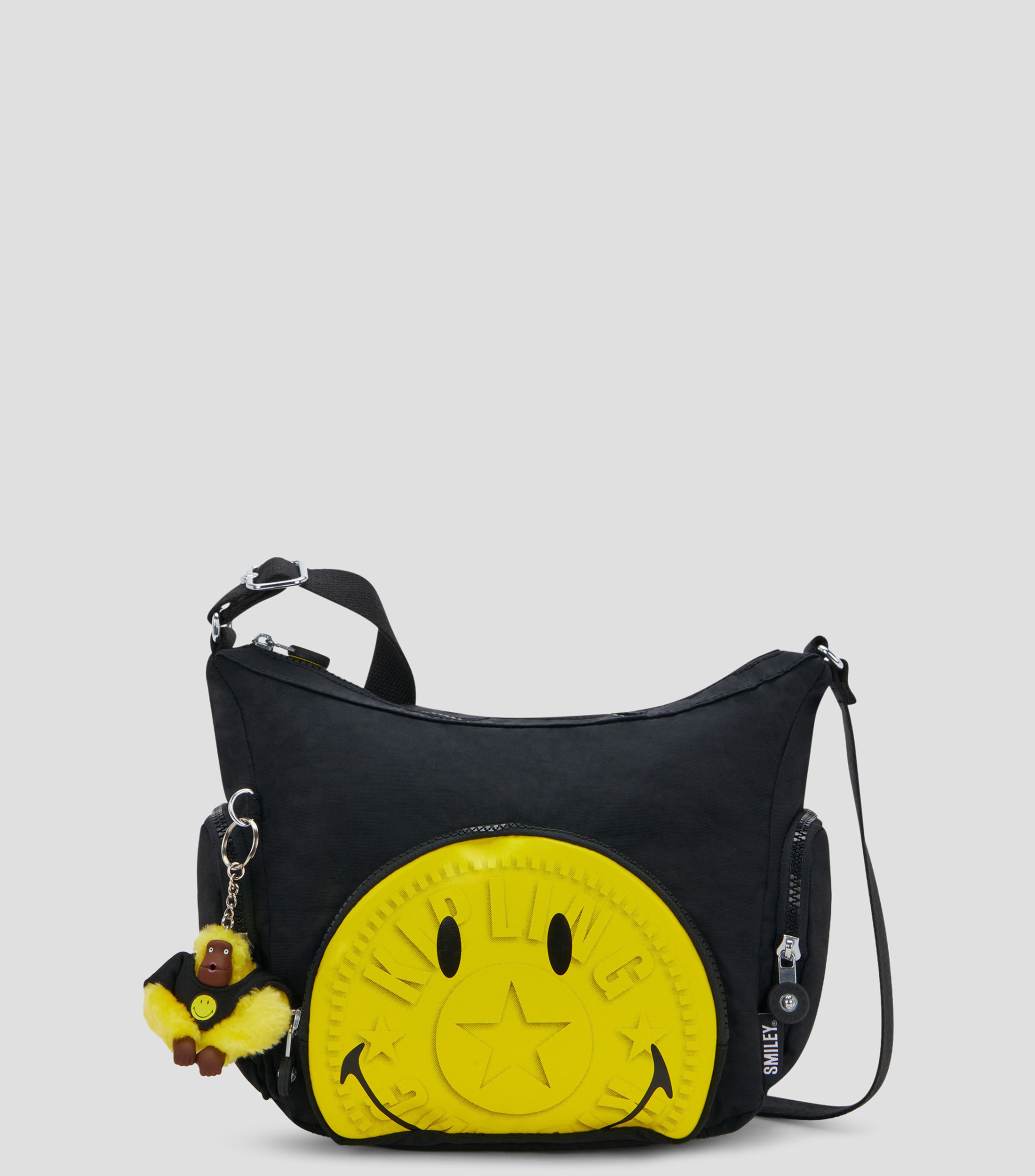 Bolsa shoulder negro y amarillo estampada Niña