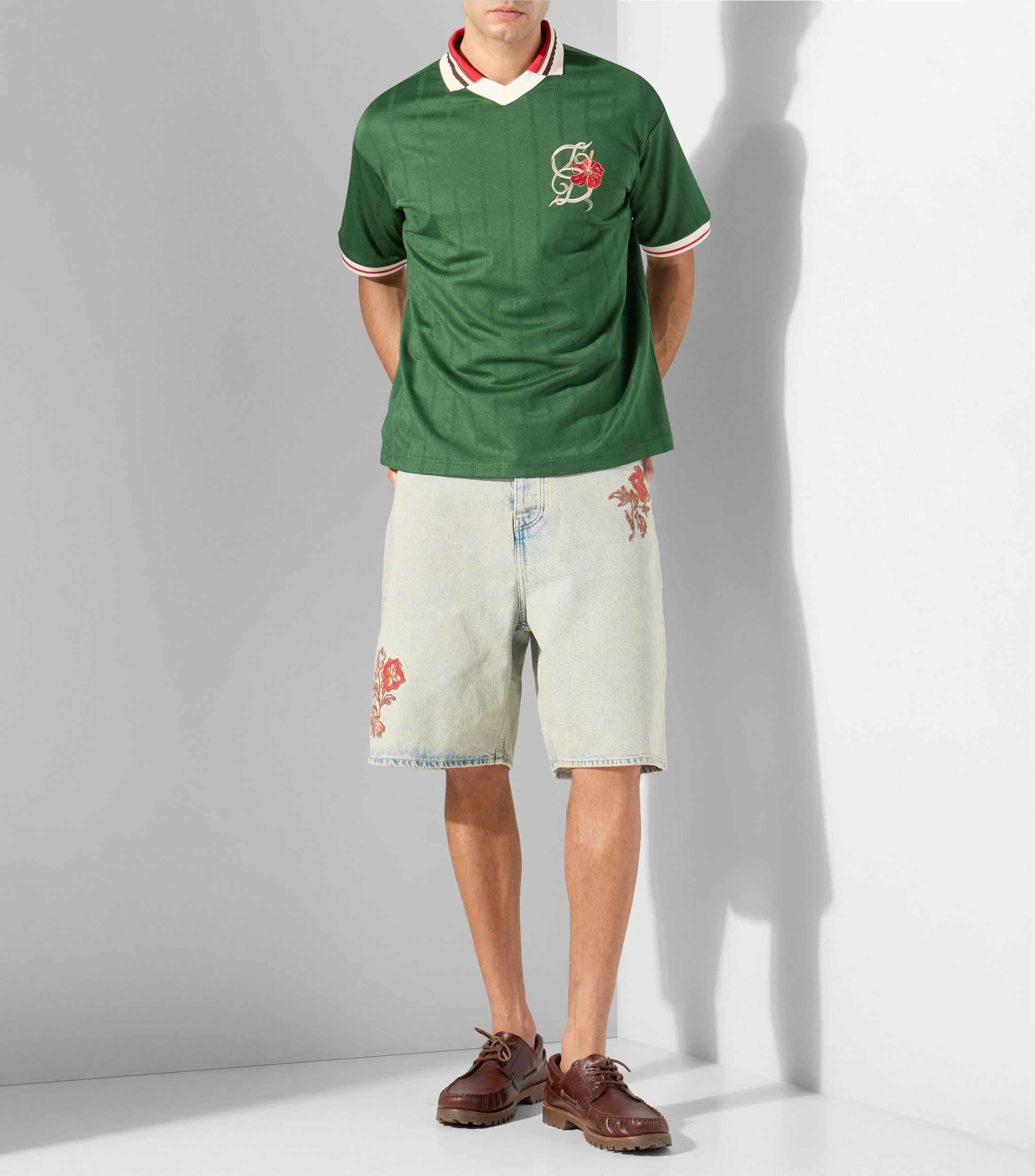 Playera tipo polo manga corta a rayas Hombre