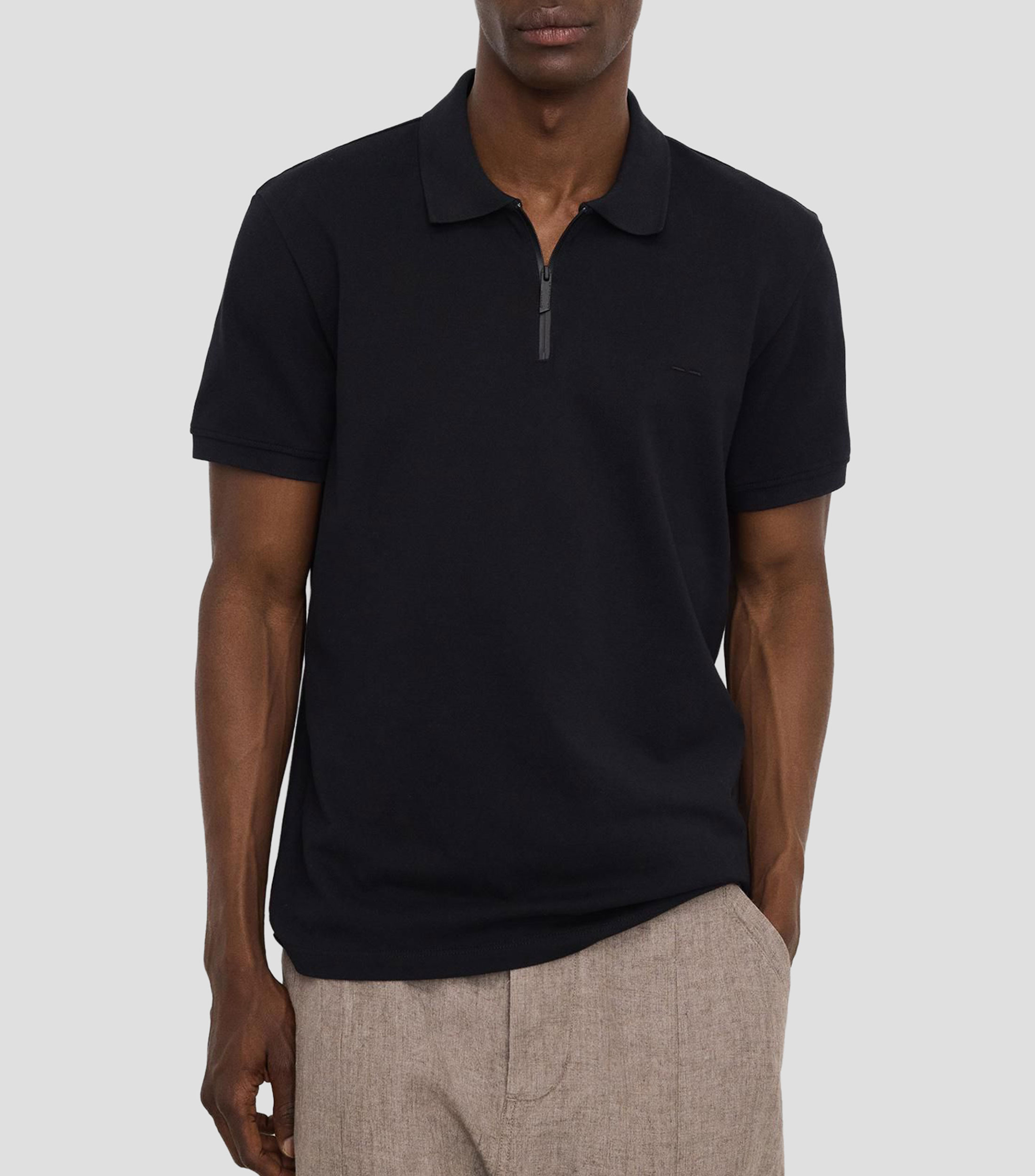 Playera tipo polo con manga corta lisa Hombre