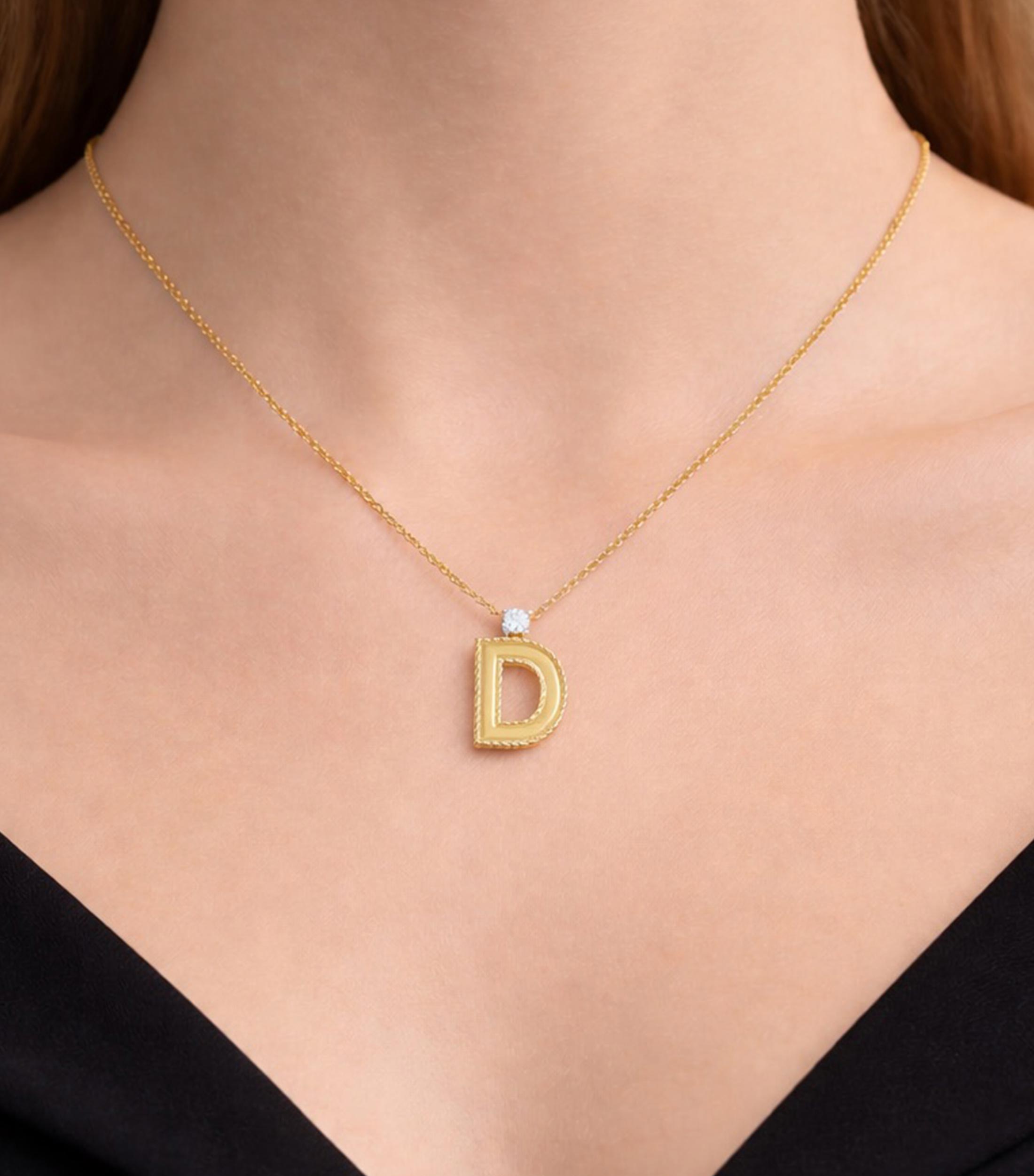 Colgante en Oro 18 Kilates Letter quotDquot con Diamante Mujer