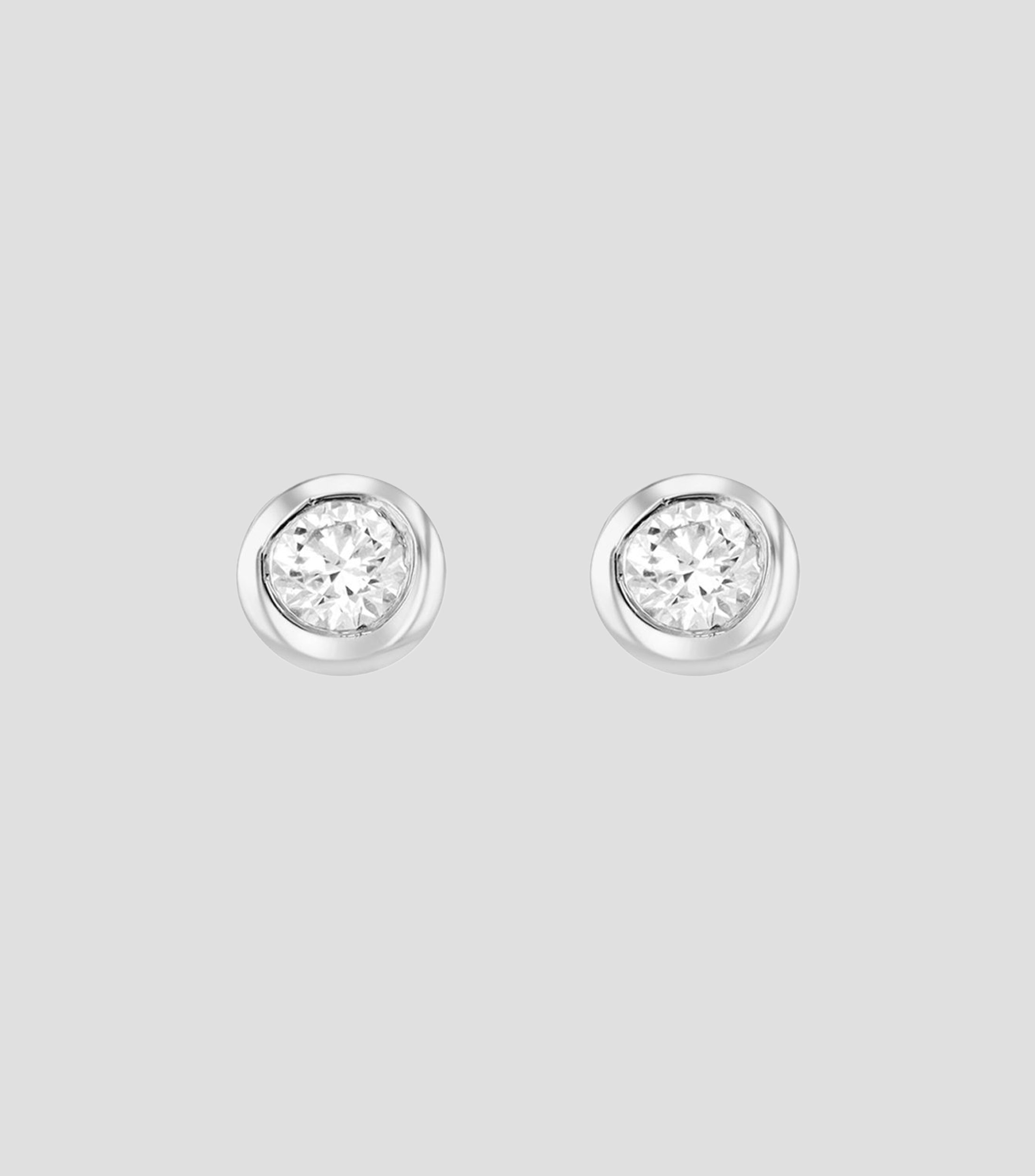 Aretes en Oro blanco de 18 Kilates con diamantes Classic Mujer