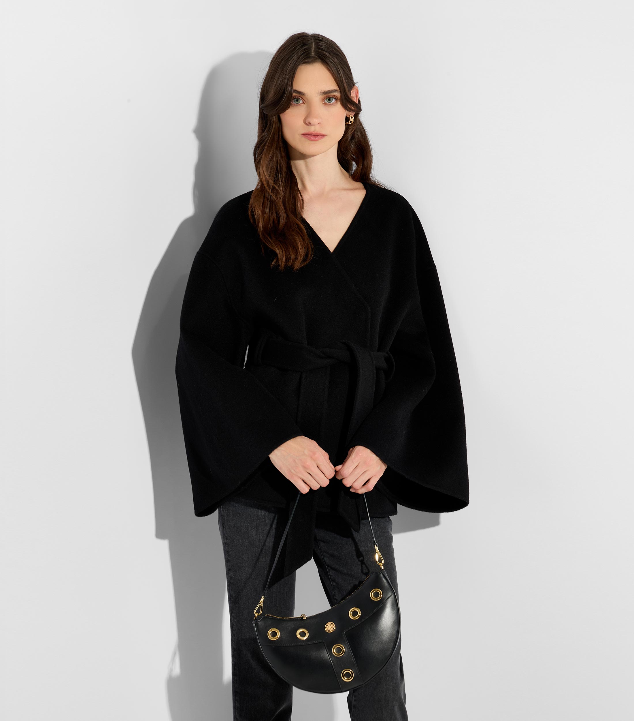 Bolsa hobo en piel lisa con detalle texturizado Mujer