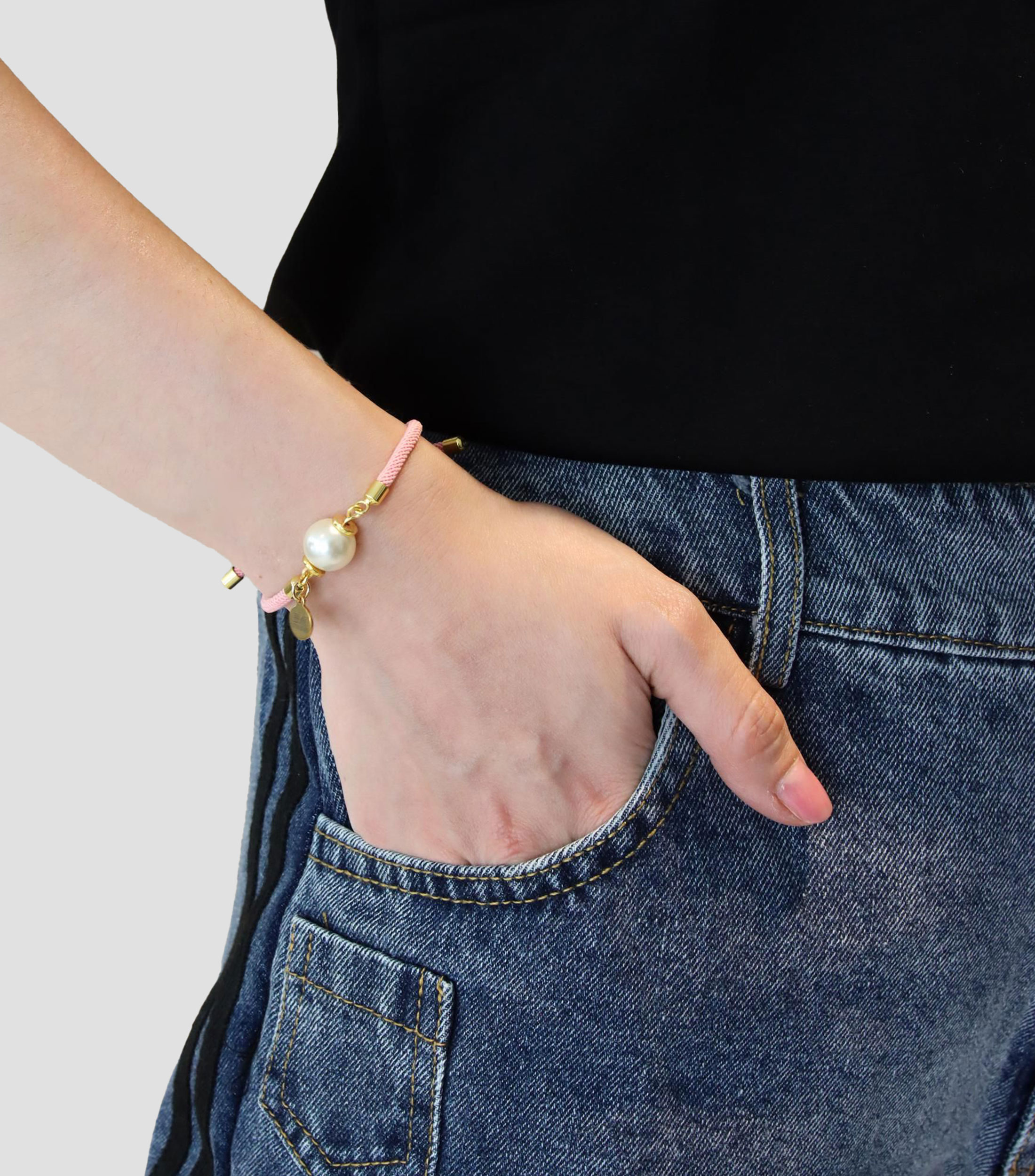 Pulsera rosa con perla Mujer