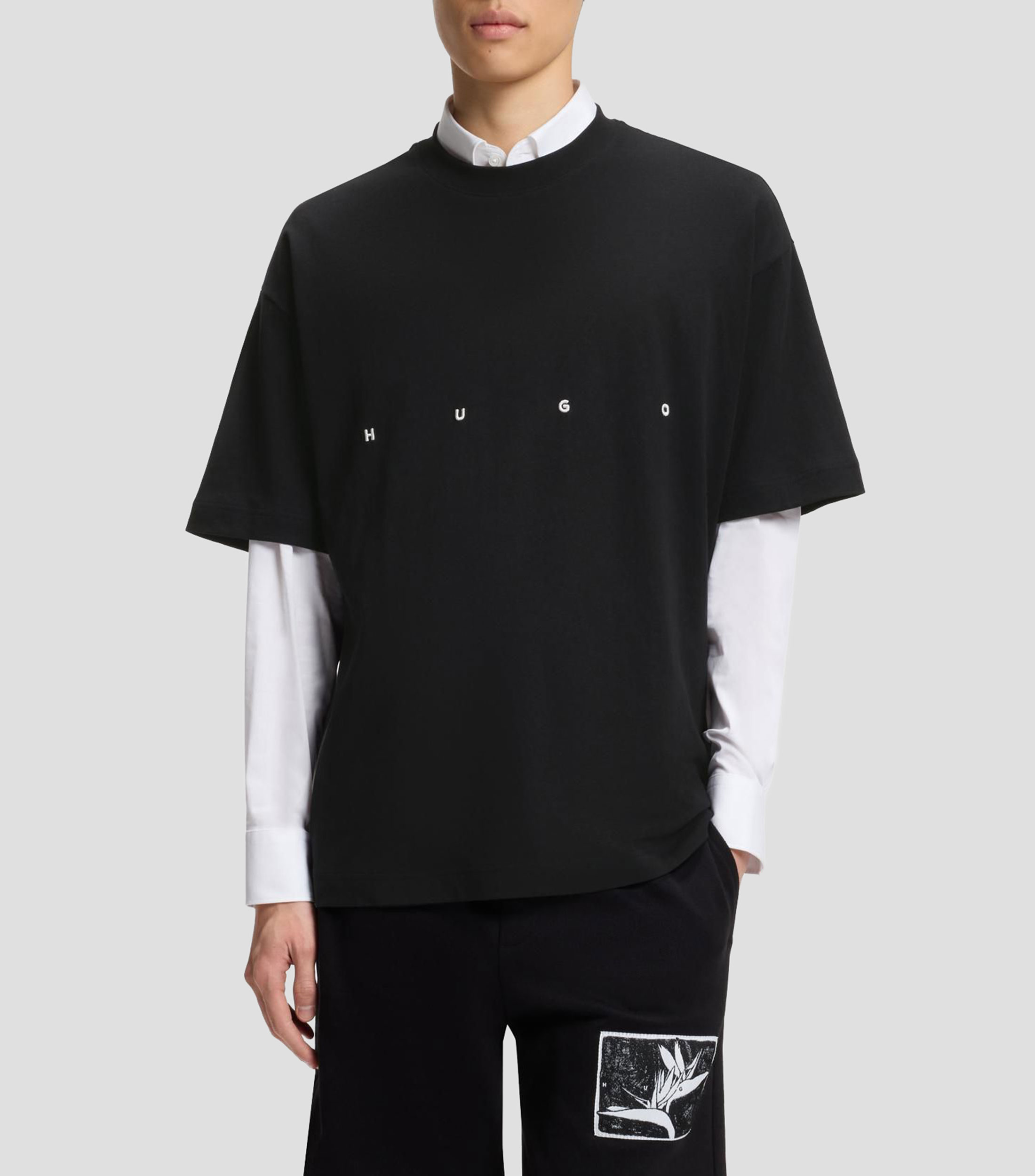 Playera amplia de algodón con llamativo logo estampado Hombre