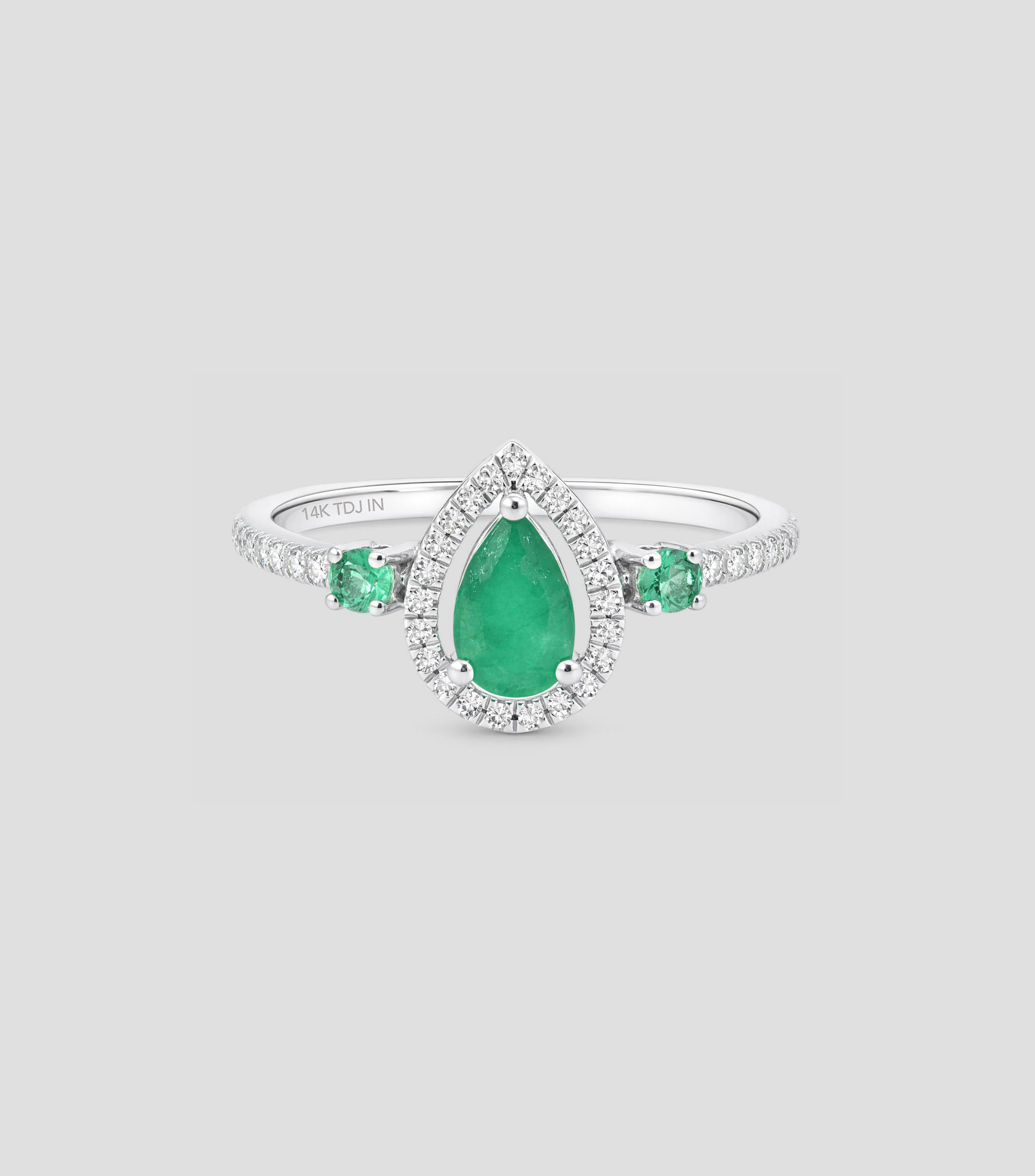 Anillo en Oro blanco de 14 Kilates con diamantes y esmeralda Mujer