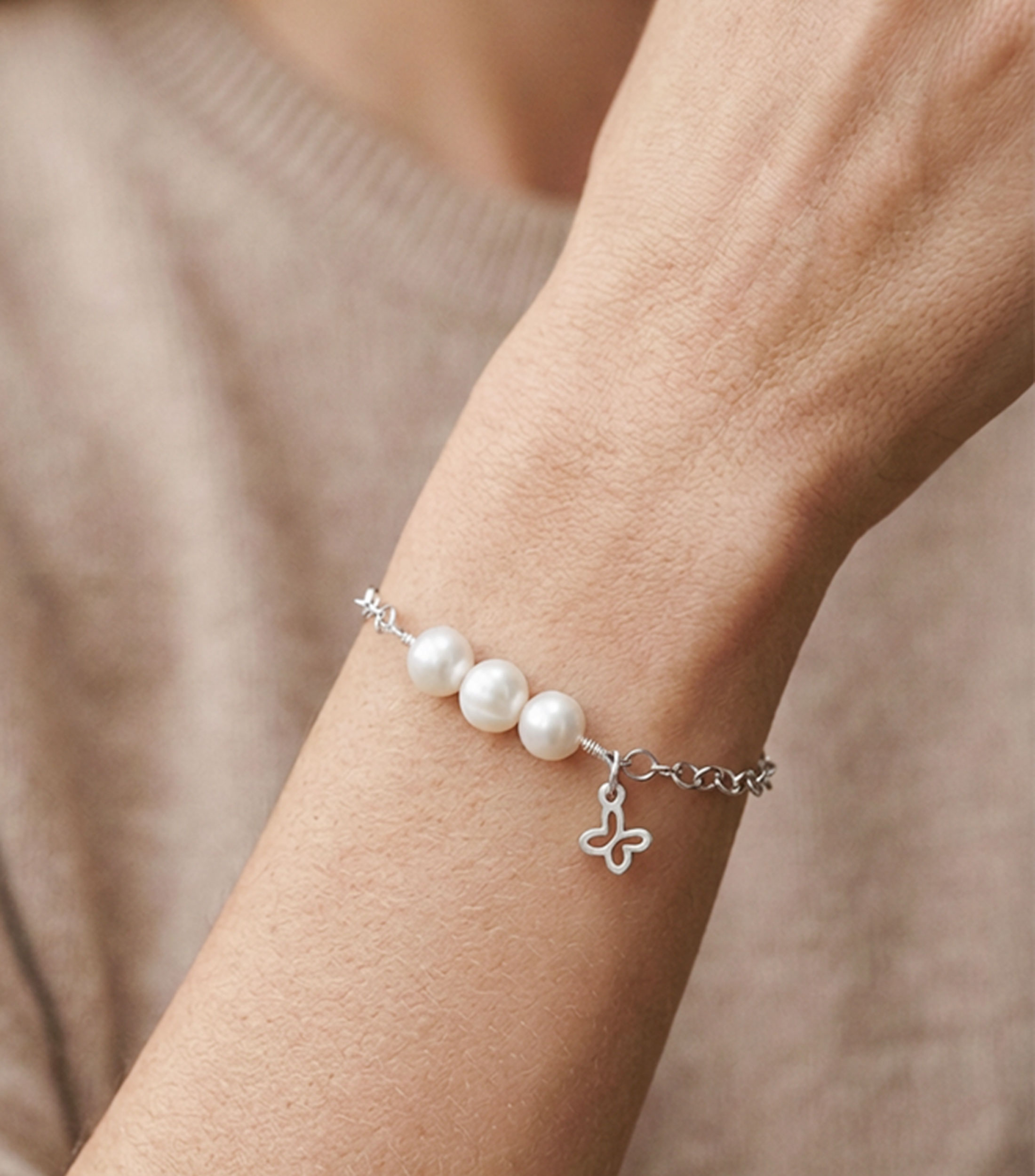 Pulsera en Plata .925 mini mariposa y perlas Mujer