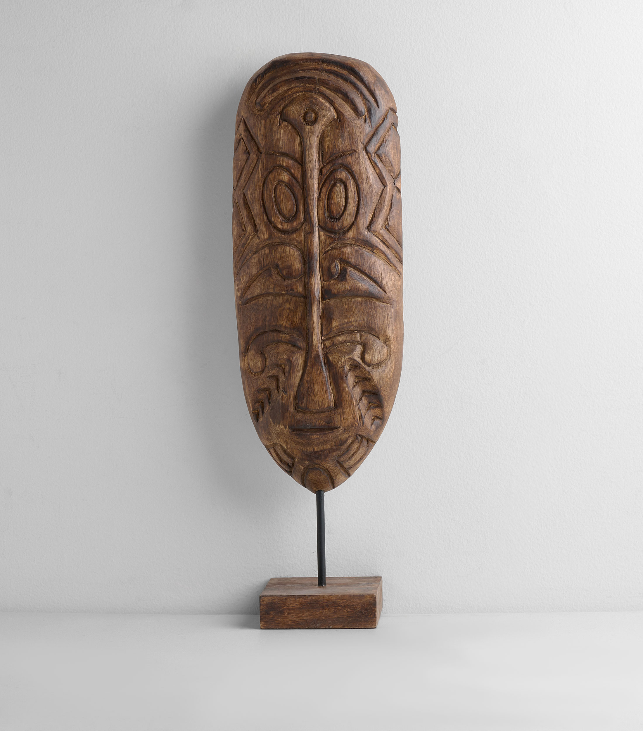 Figura decorativa de máscara en madera