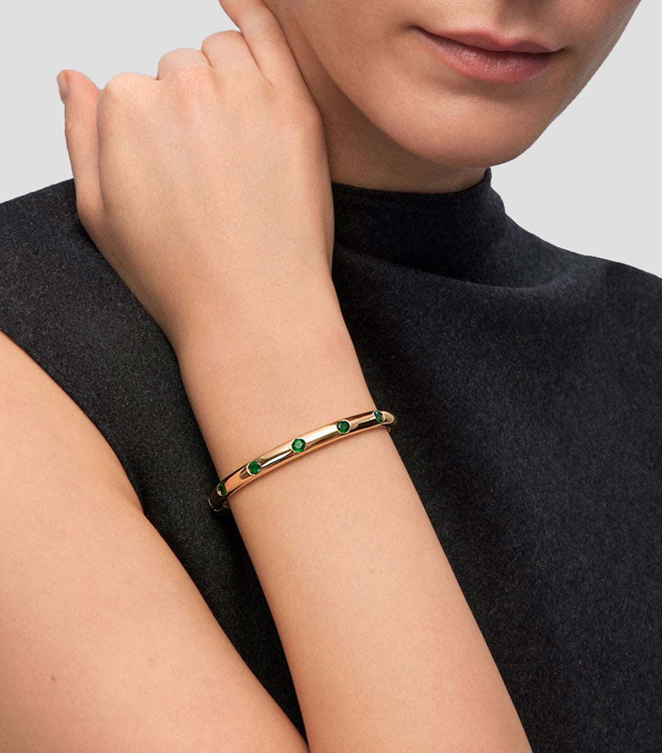 Pulsera en oro amarillo 18 Kilates con esmeraldas Mujer
