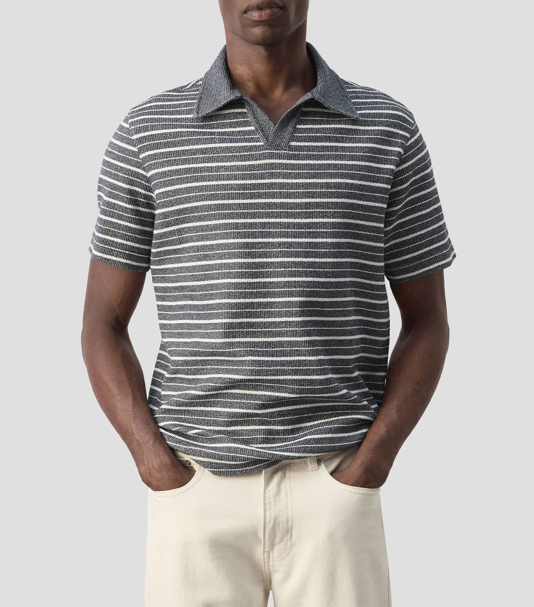 Playera tipo polo manga corta de rayas Hombre
