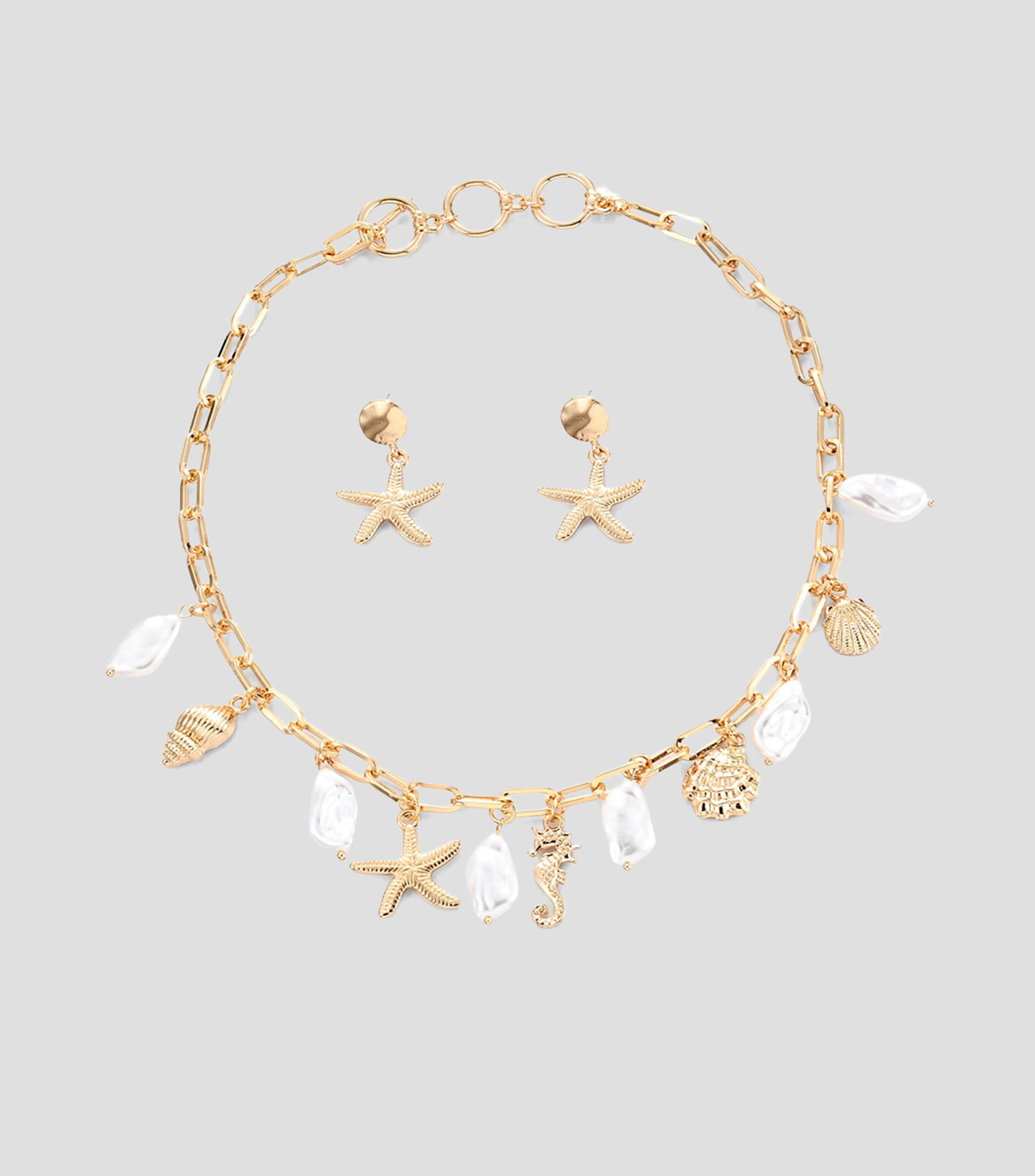 Set de collar y aretes Mujer