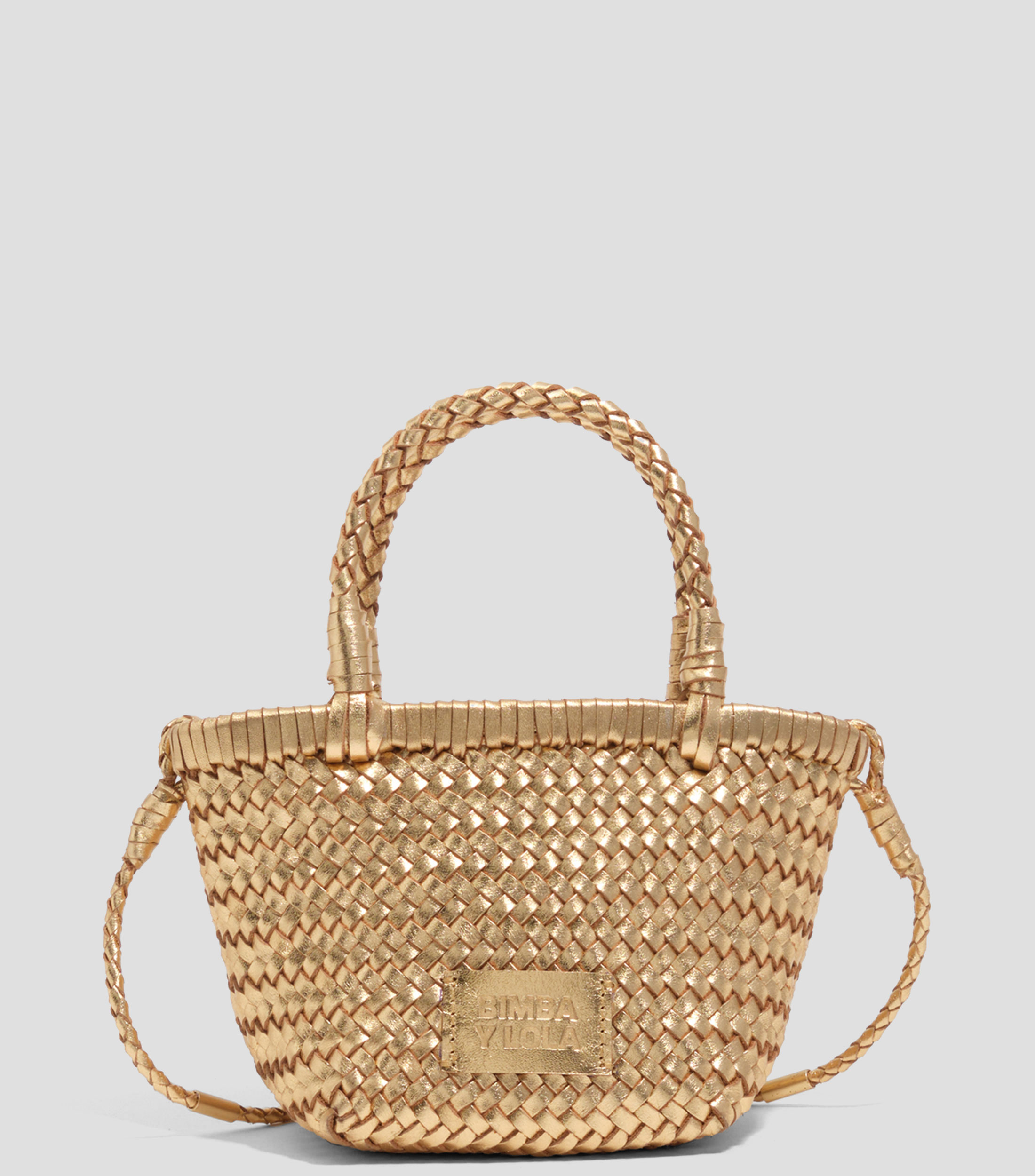Bolsa mini trenzada en piel Mujer