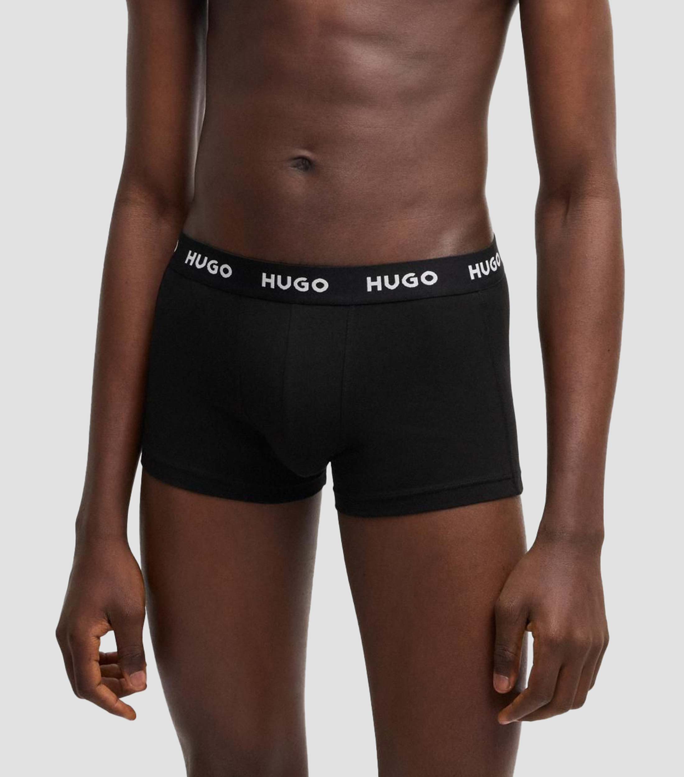 Paquete de tres boxers de algodón elástico con logos en la cintura Hombre