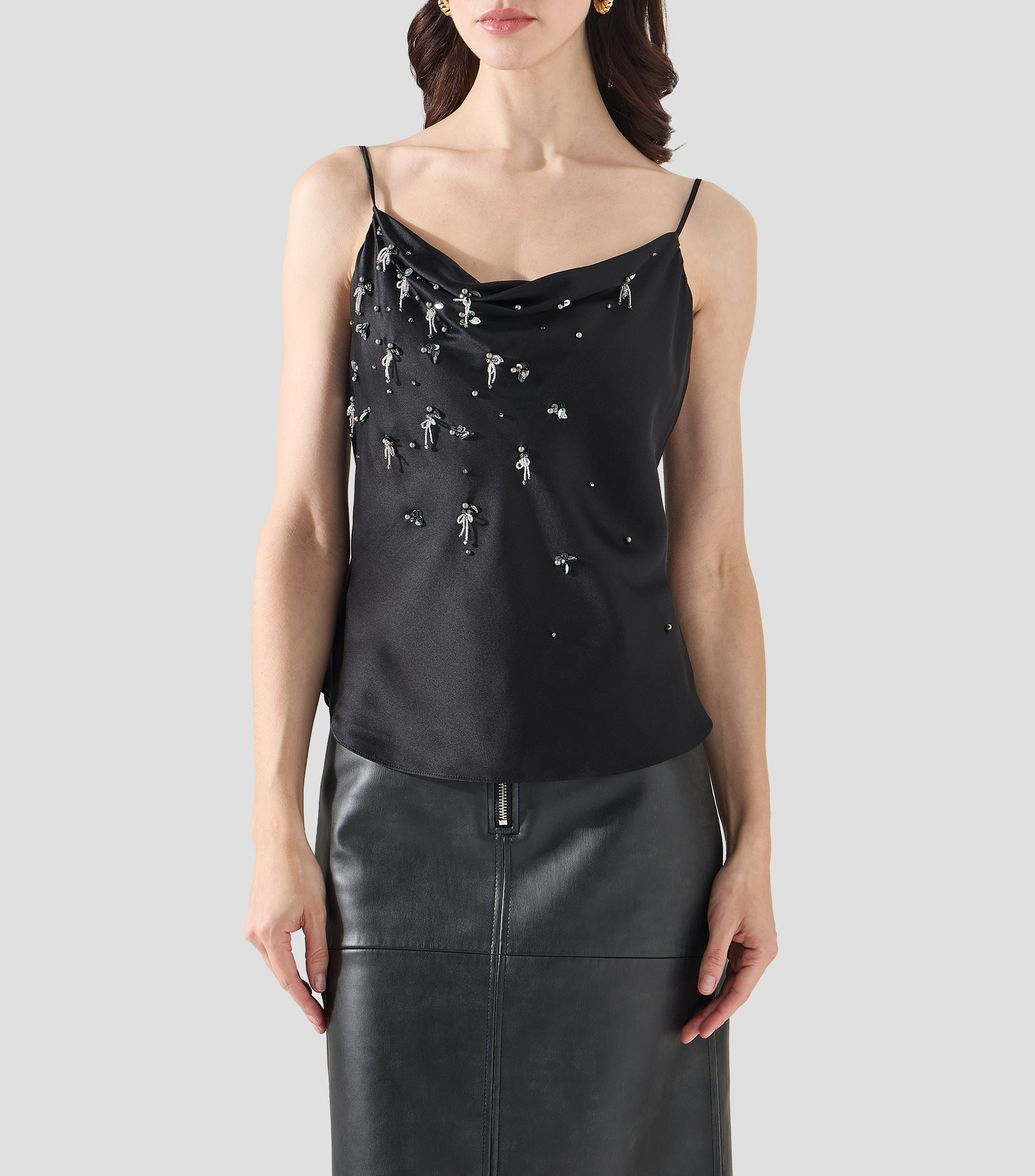 Blusa lisa sin mangas Mujer