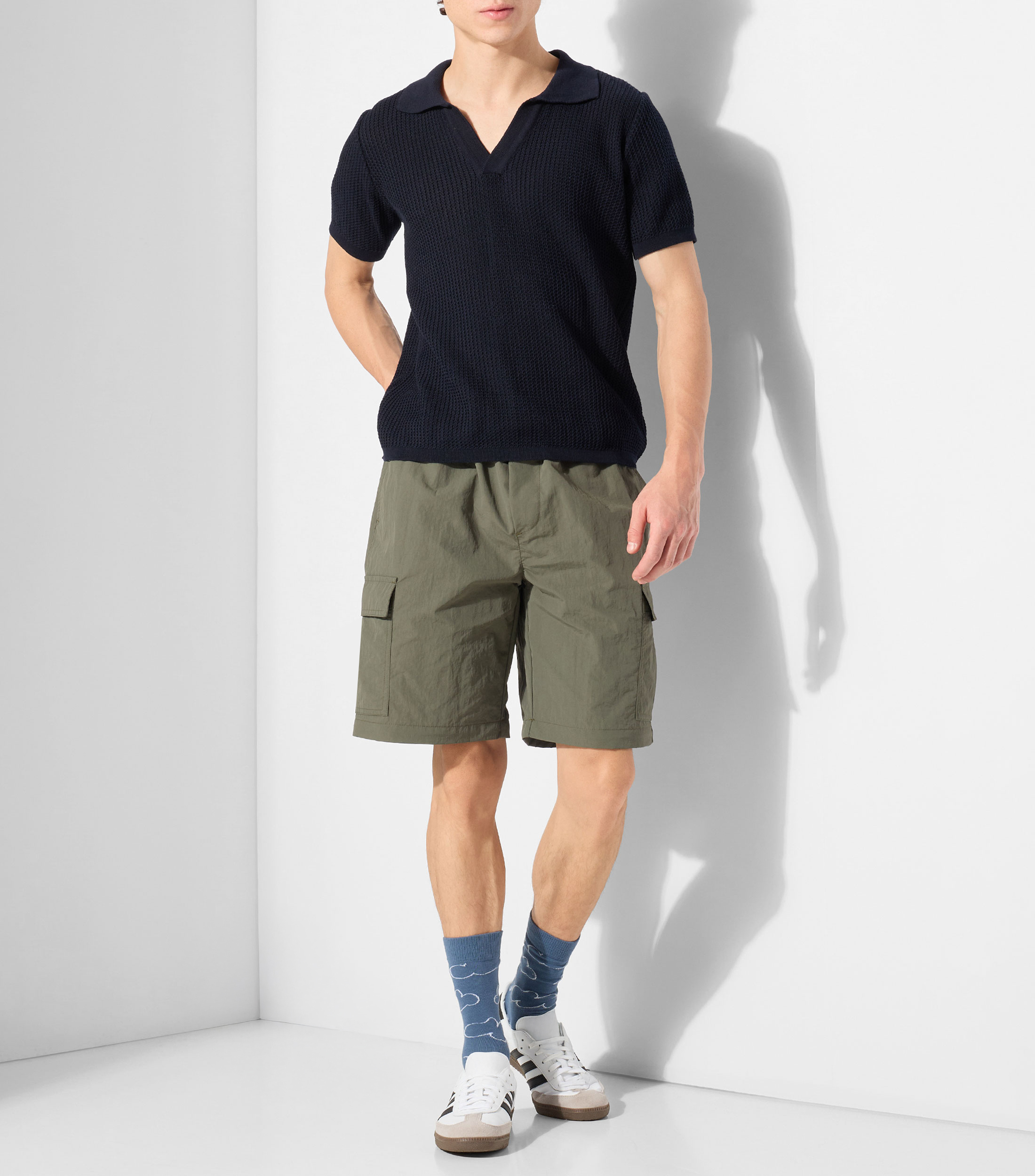 Playera tipo polo con manga corta lisa Hombre