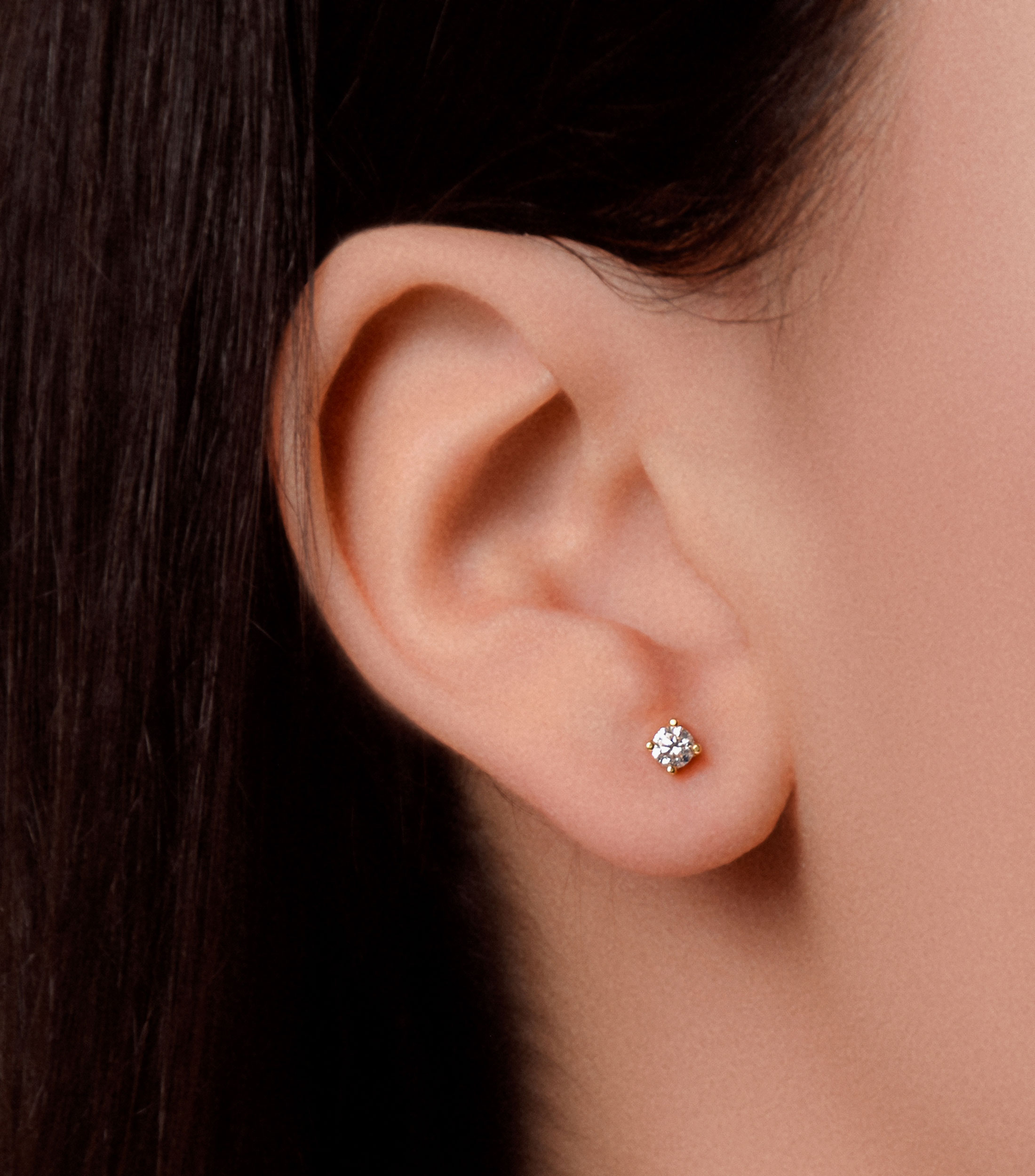 Broqueles en oro amarillo de 14 kilates con diamantes Mujer