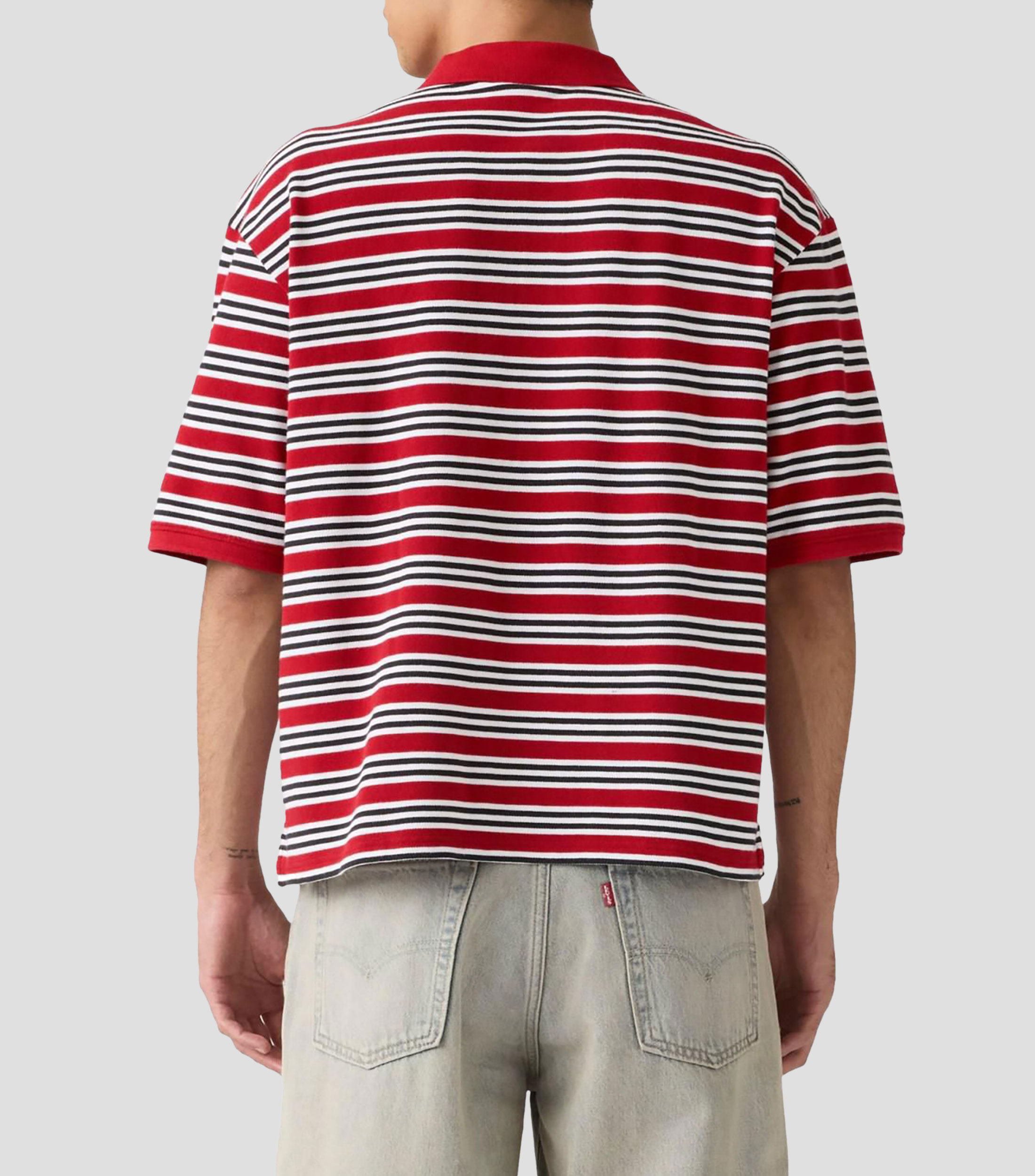 Playera tipo polo manga corta con líneas Hombre