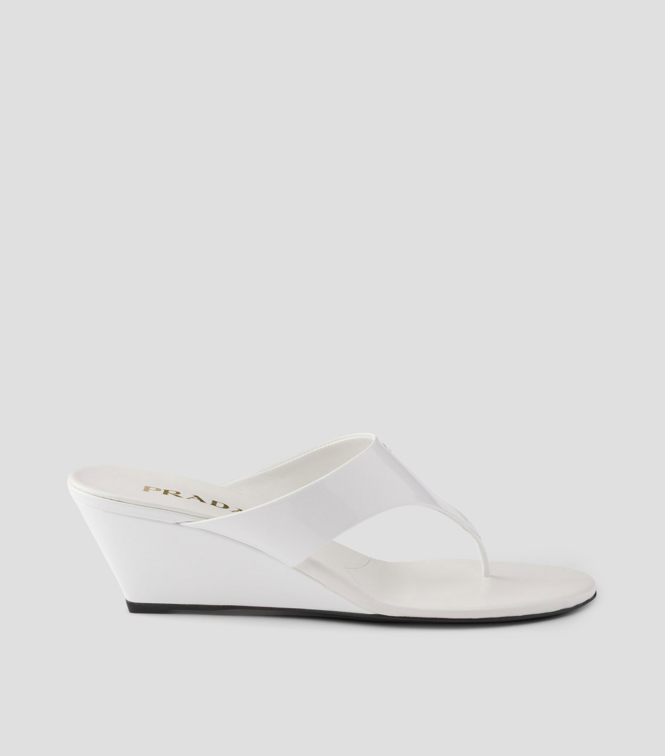 Sandalias en piel de tacón bajo de cuña Mujer
