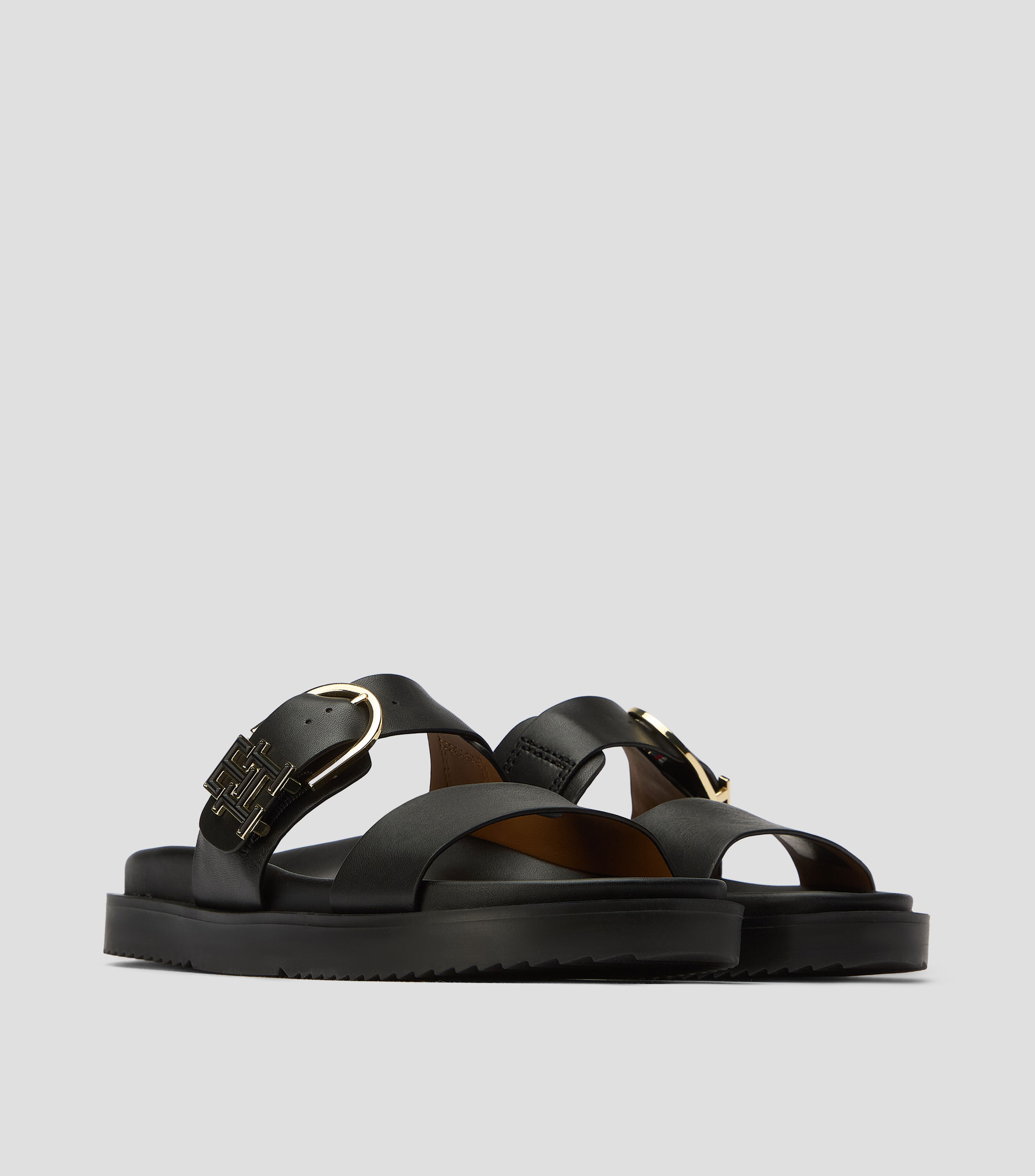 Sandalias planas en piel Mujer