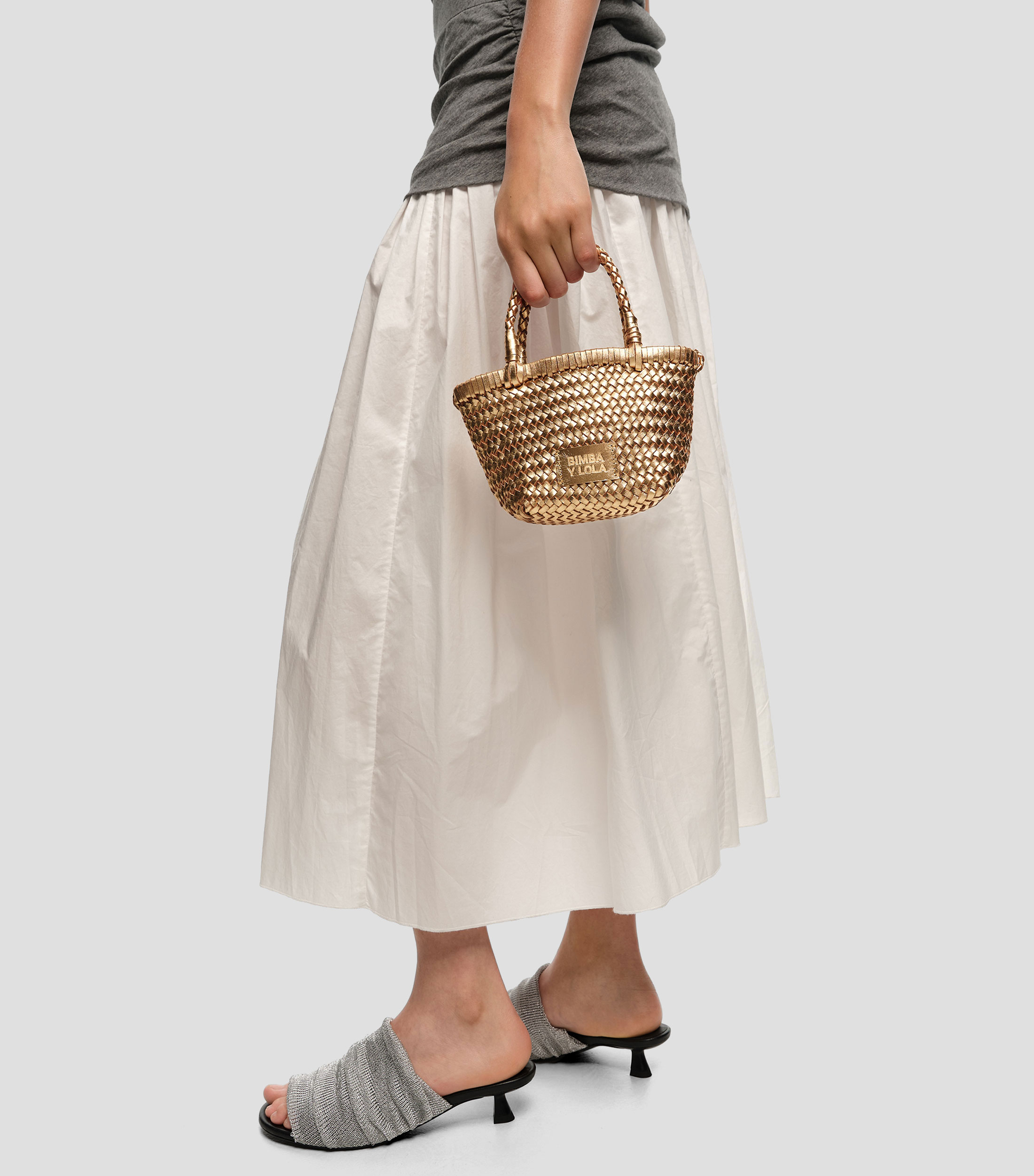 Bolsa mini trenzada en piel Mujer