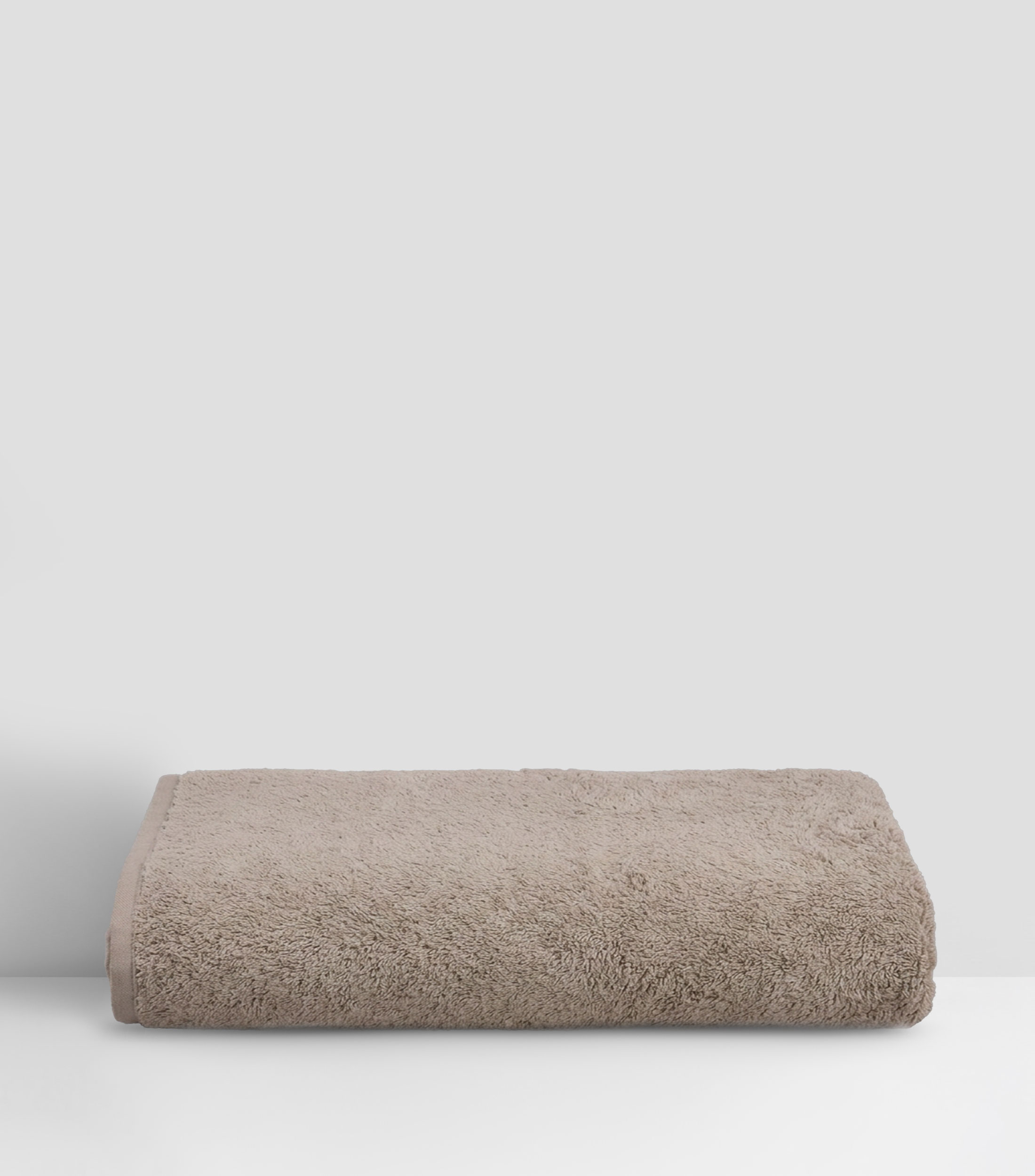Toalla de medio baño Unito beige claro