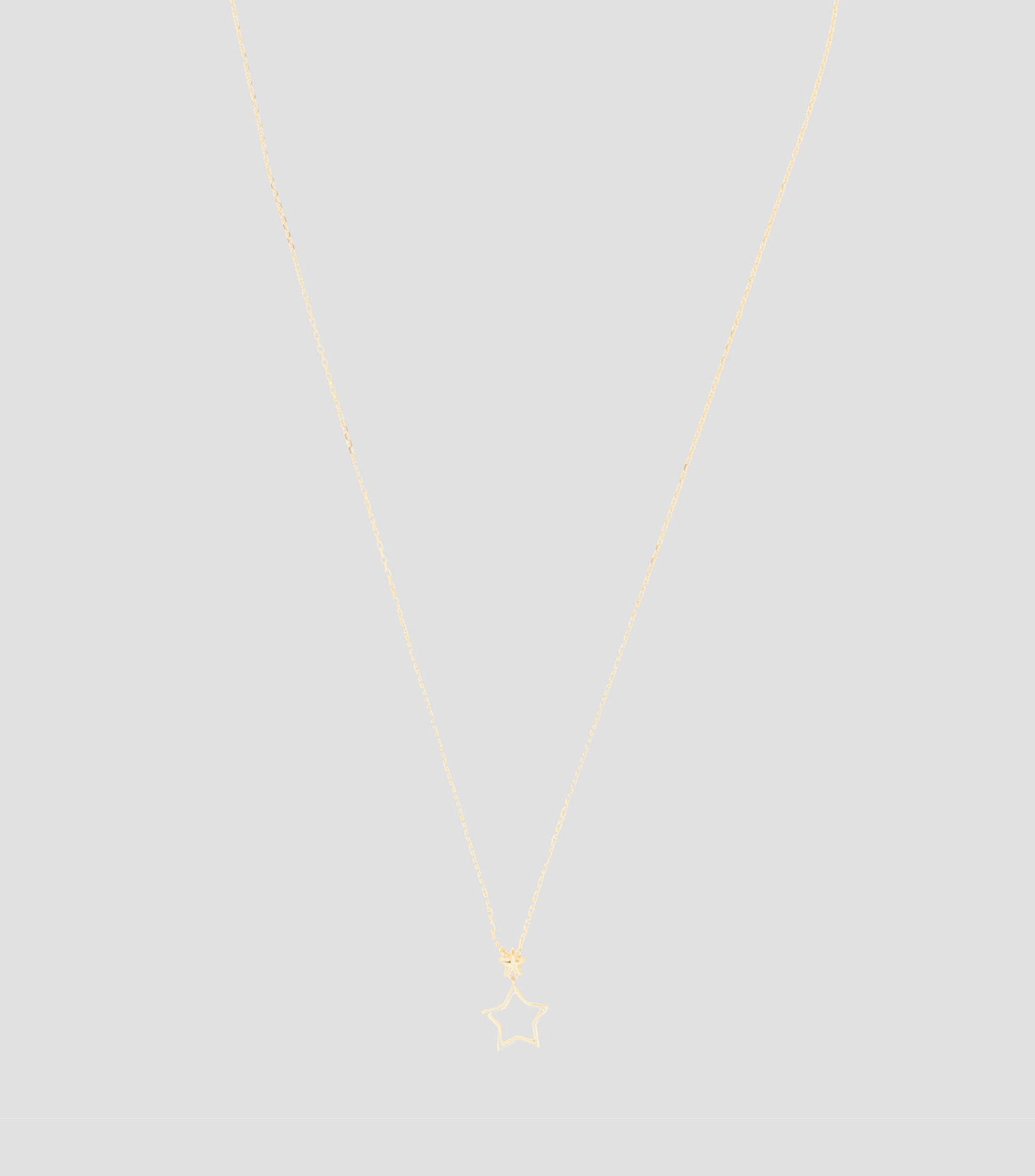 Collar en oro de 14 kilates con dije de estrella Mujer
