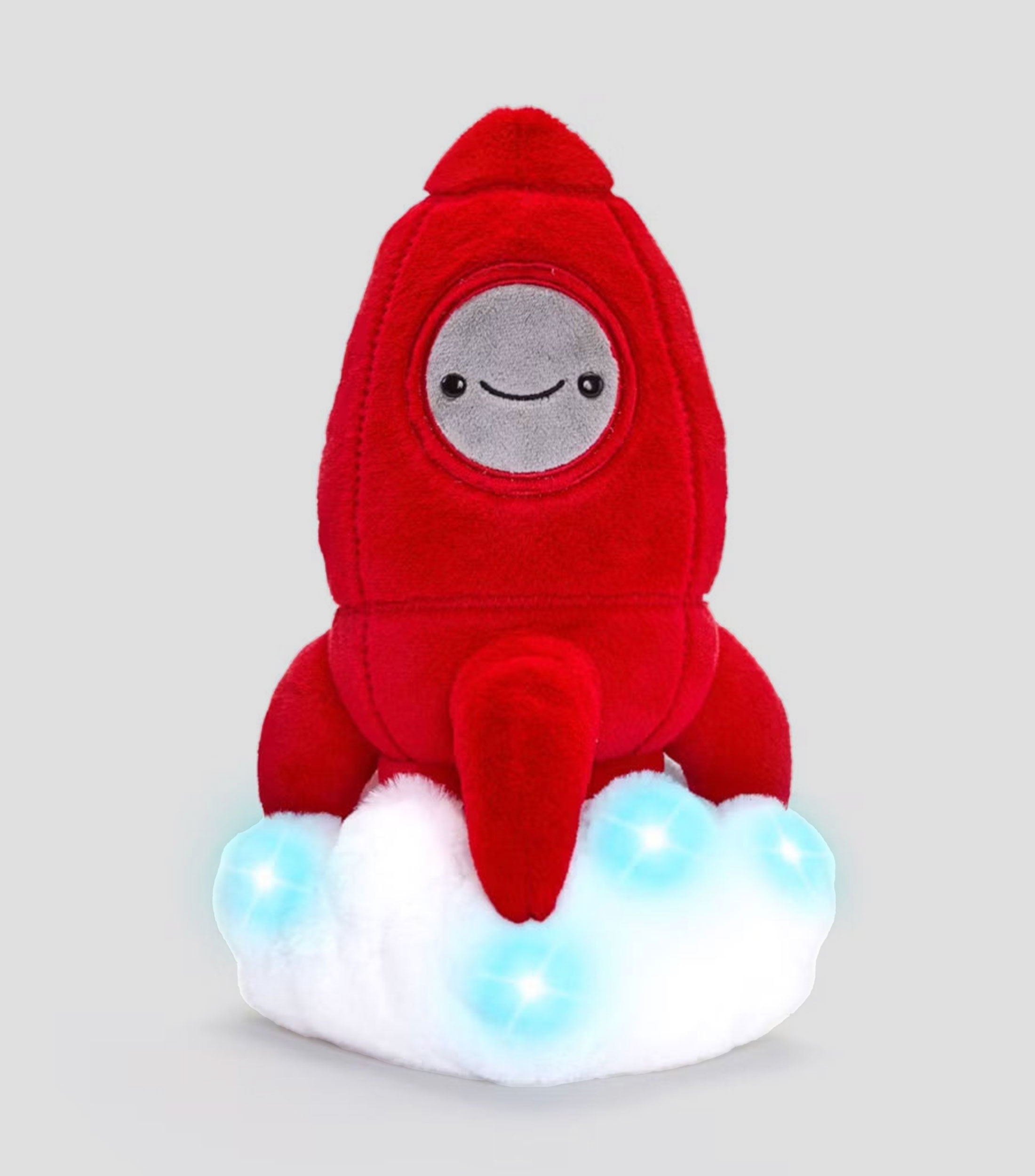 Cohete espacial de peluche con luz y sonido