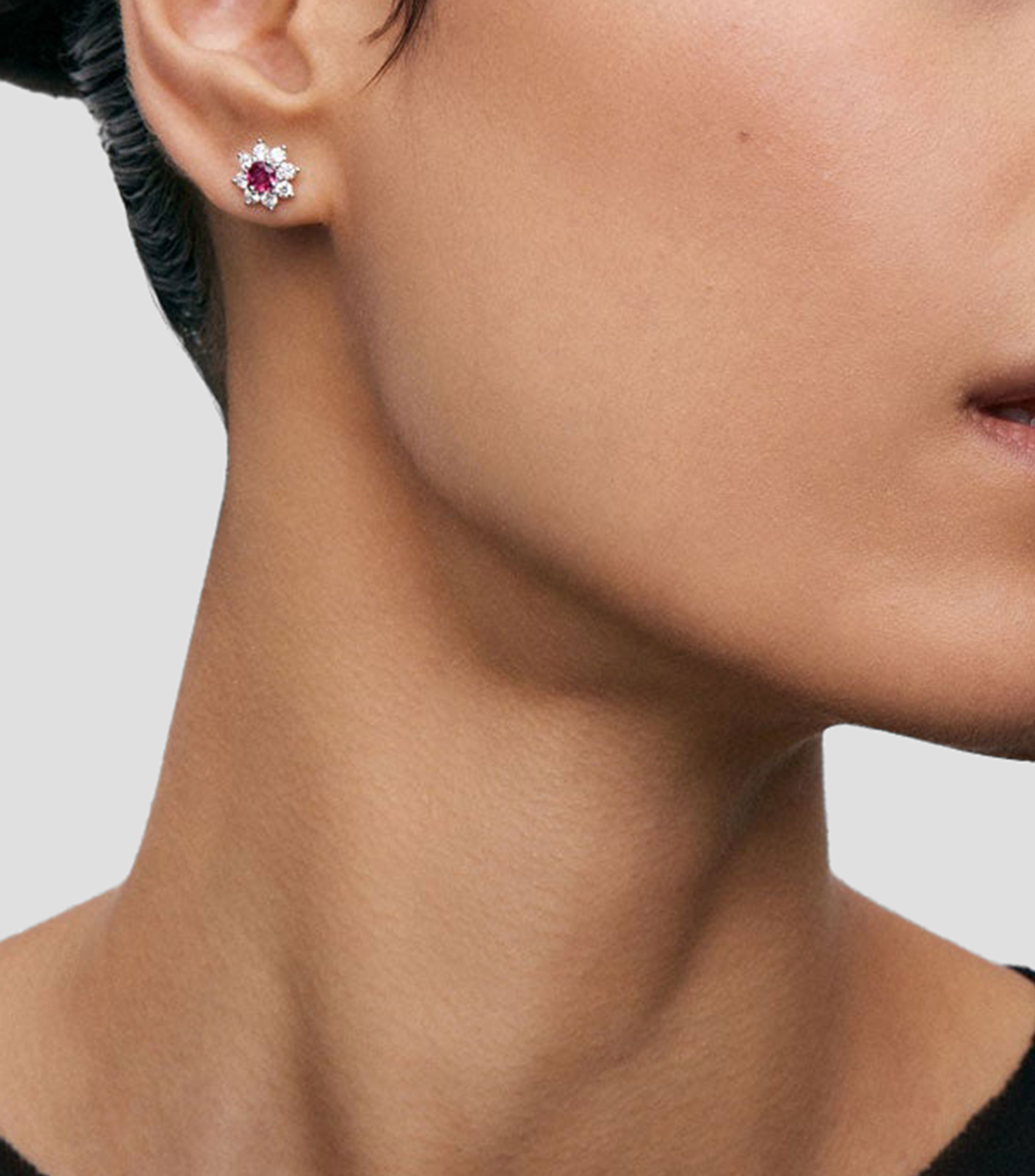 Aretes en oro de 18 kilates flor Mujer