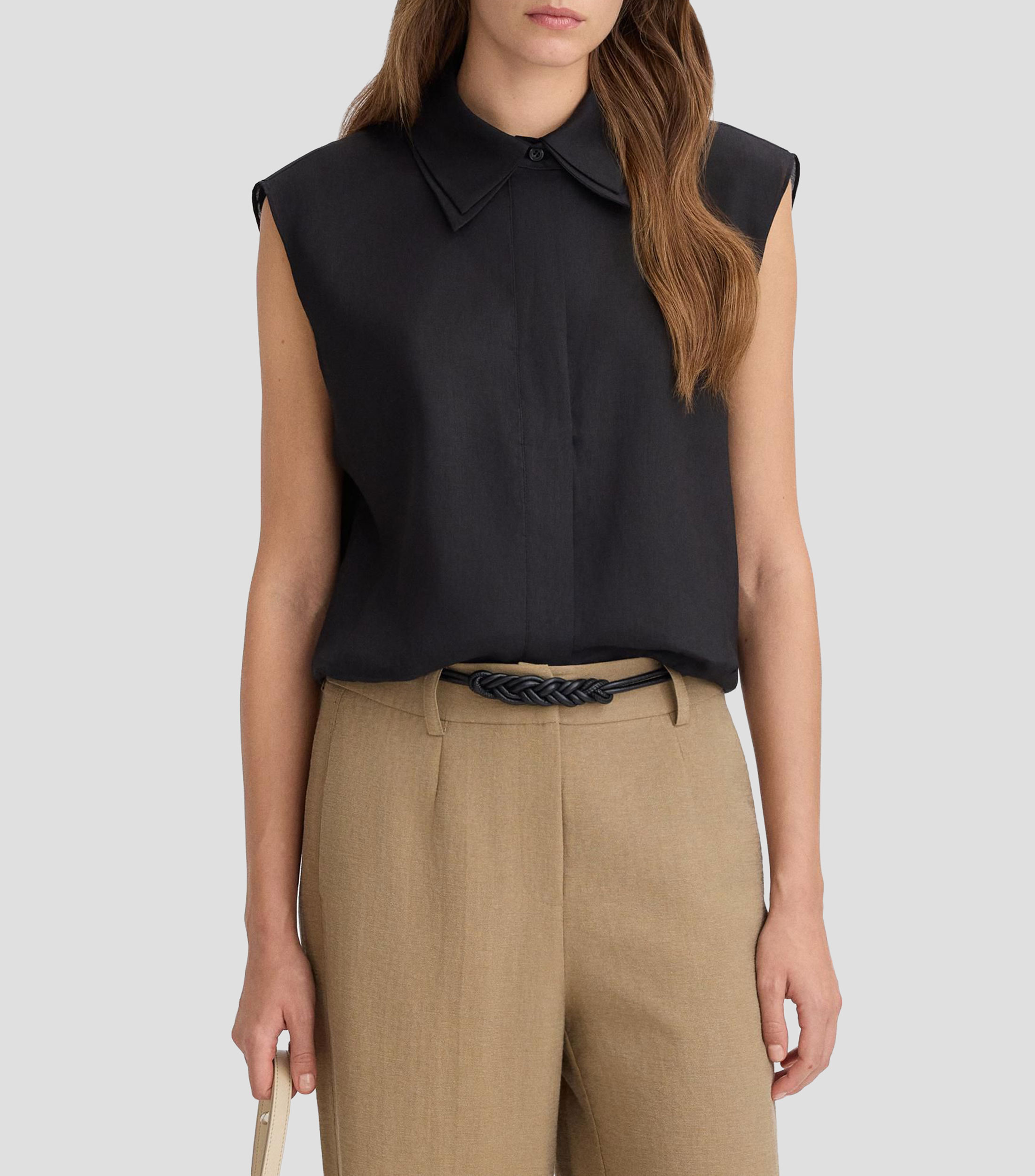 Blusa lisa sin mangas Mujer
