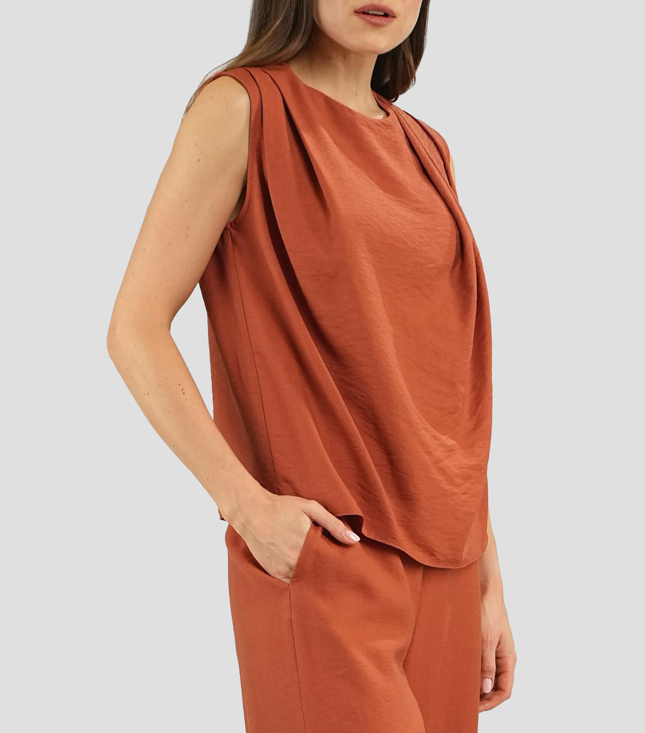 Blusa lisa sin mangas Mujer