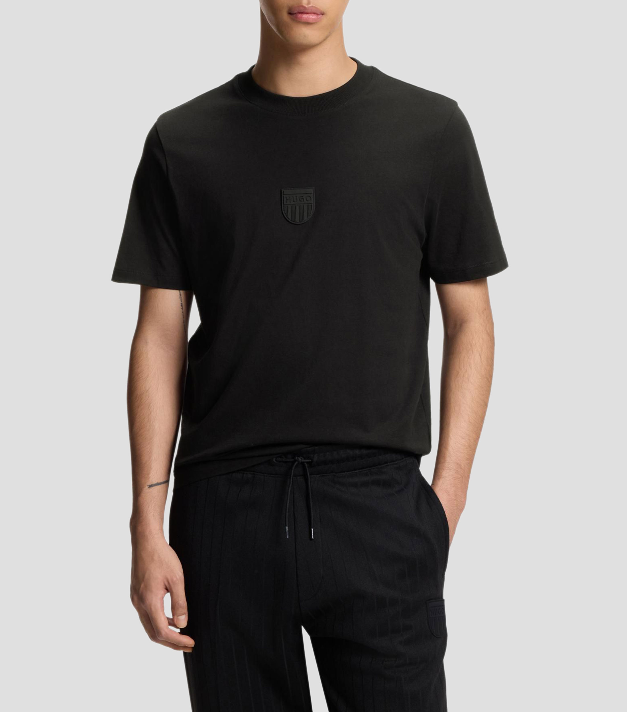 Playera de punto de algodón con logo de goma Hombre