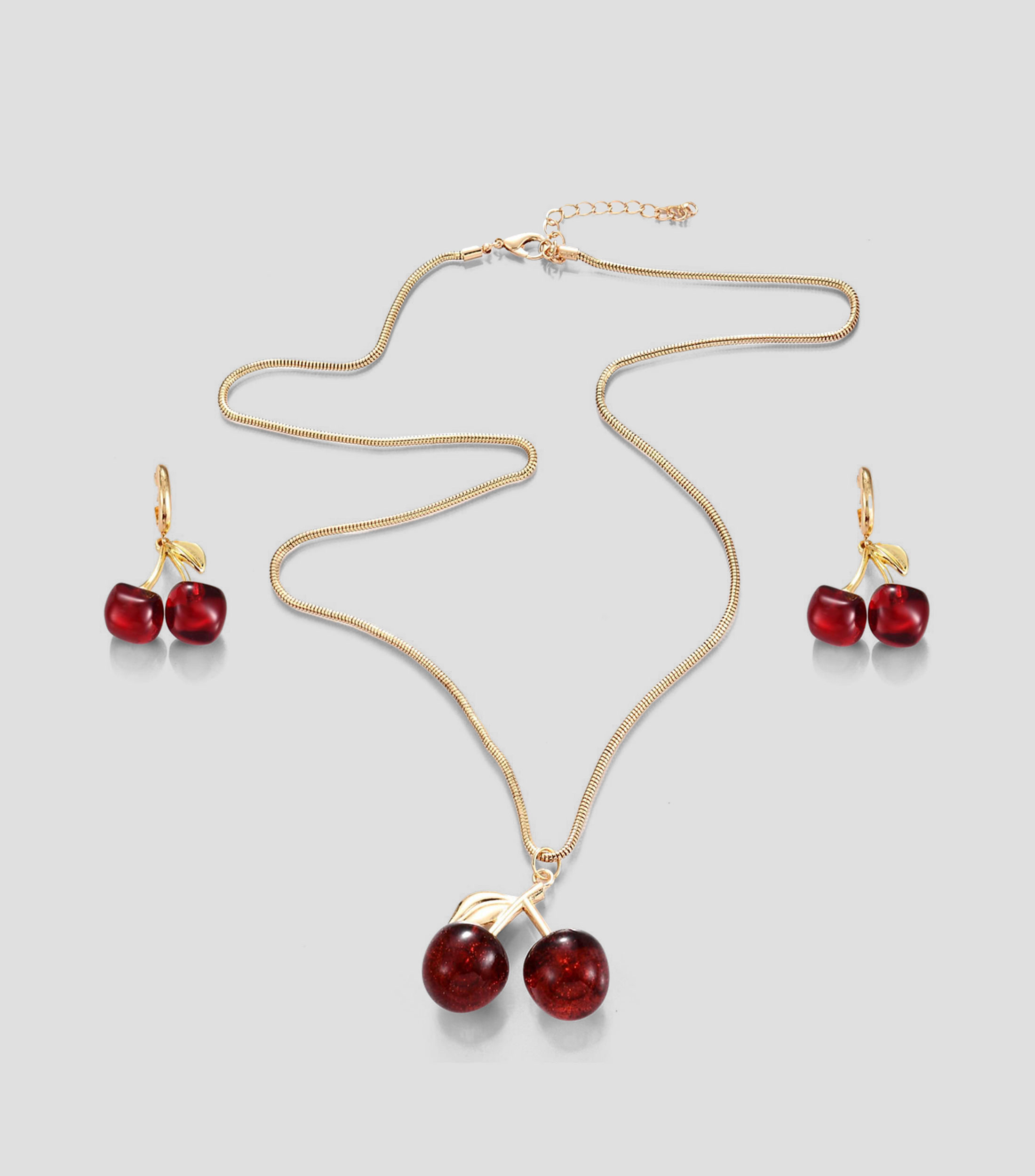 Set collar y aretes Mujer