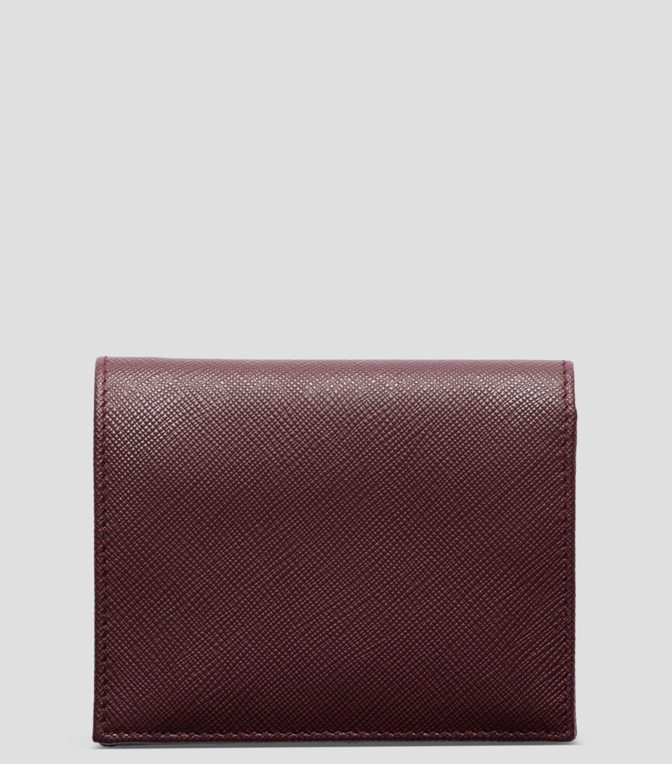 Cartera en piel con detalle texturizado Mujer
