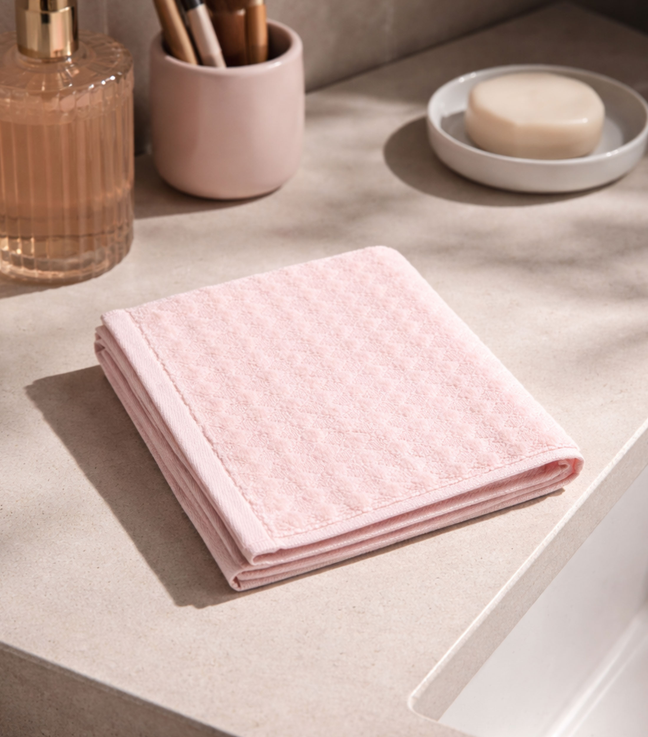 Toalla facial rosa