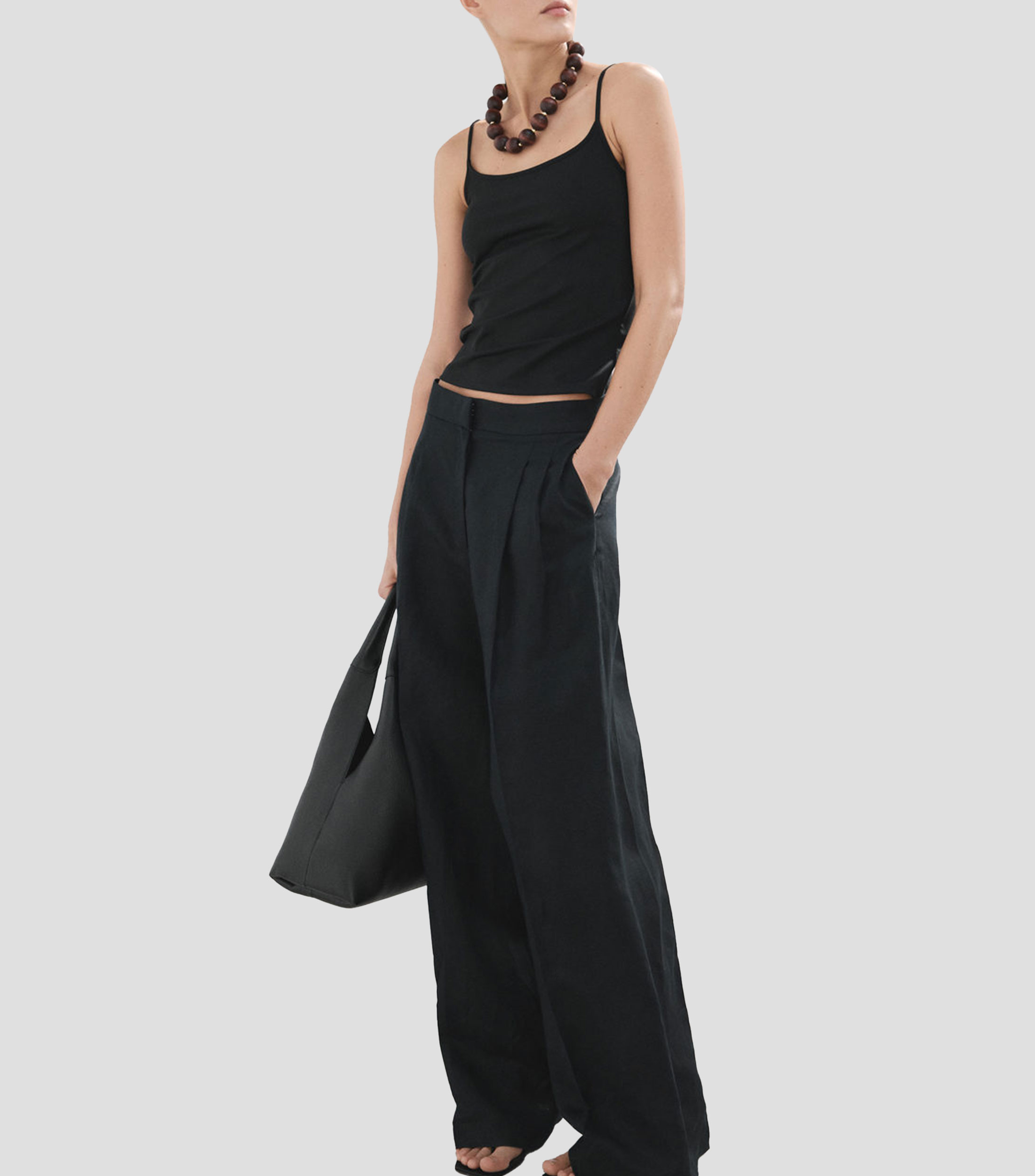 Blusa lisa sin mangas Mujer