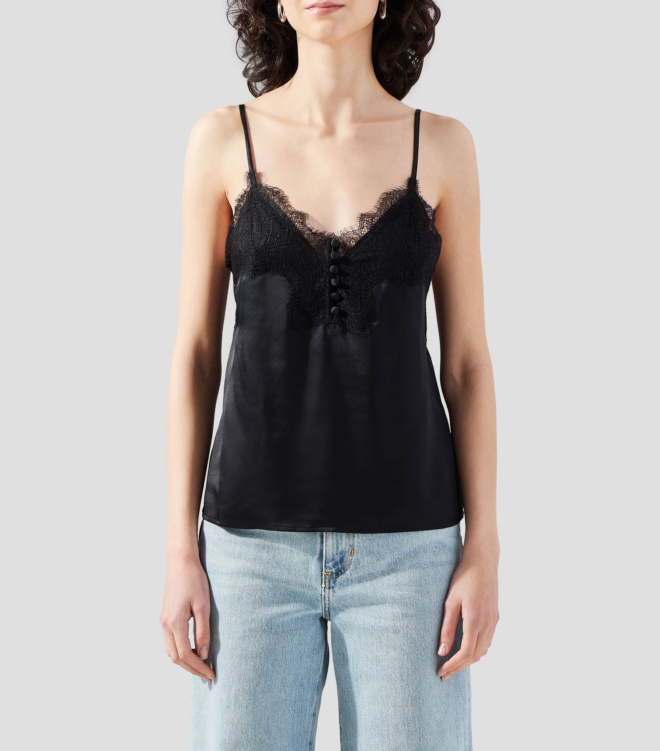 Blusa lisa sin mangas Mujer