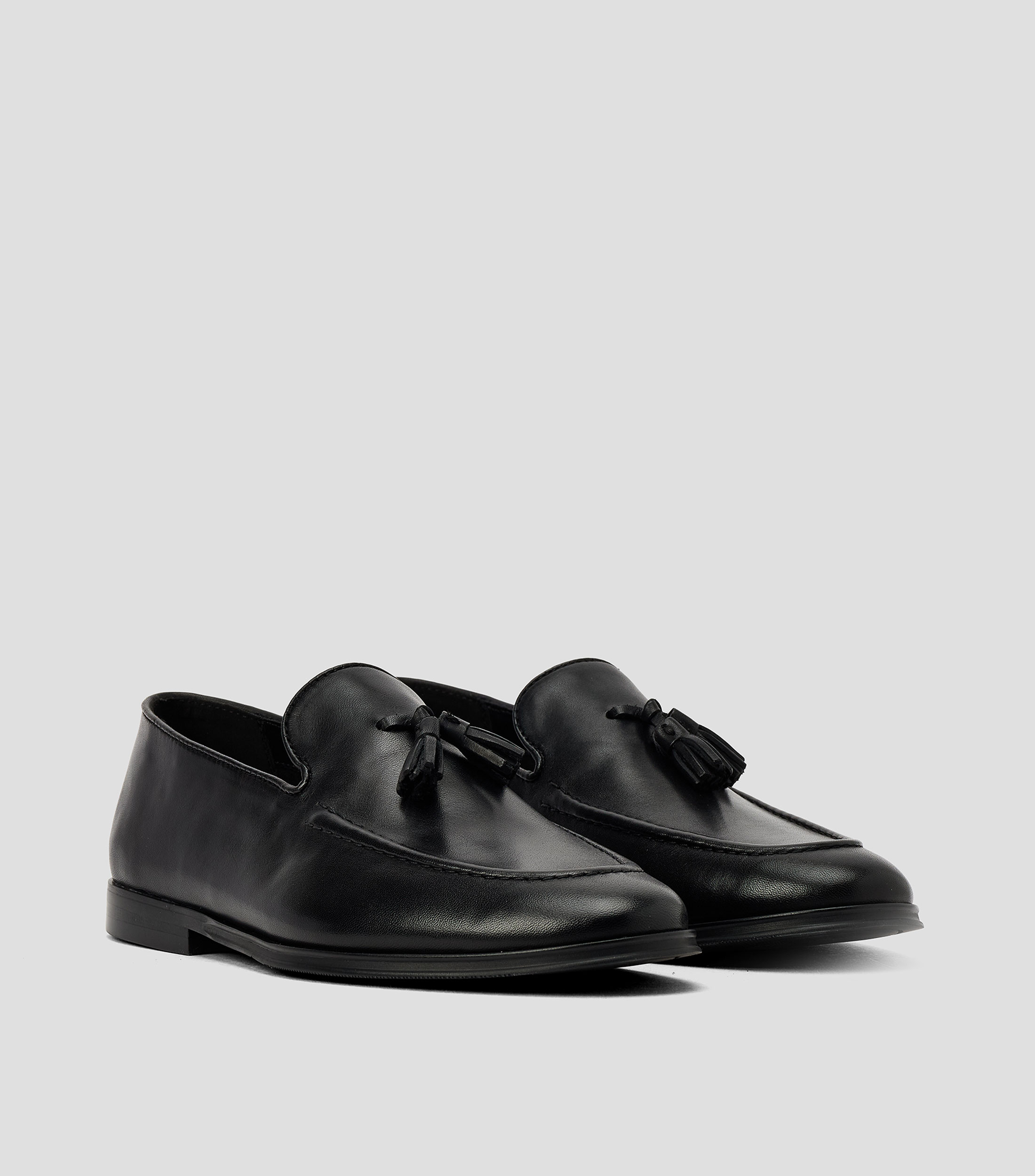 Mocasines en cuero vacuno con adorno Hombre