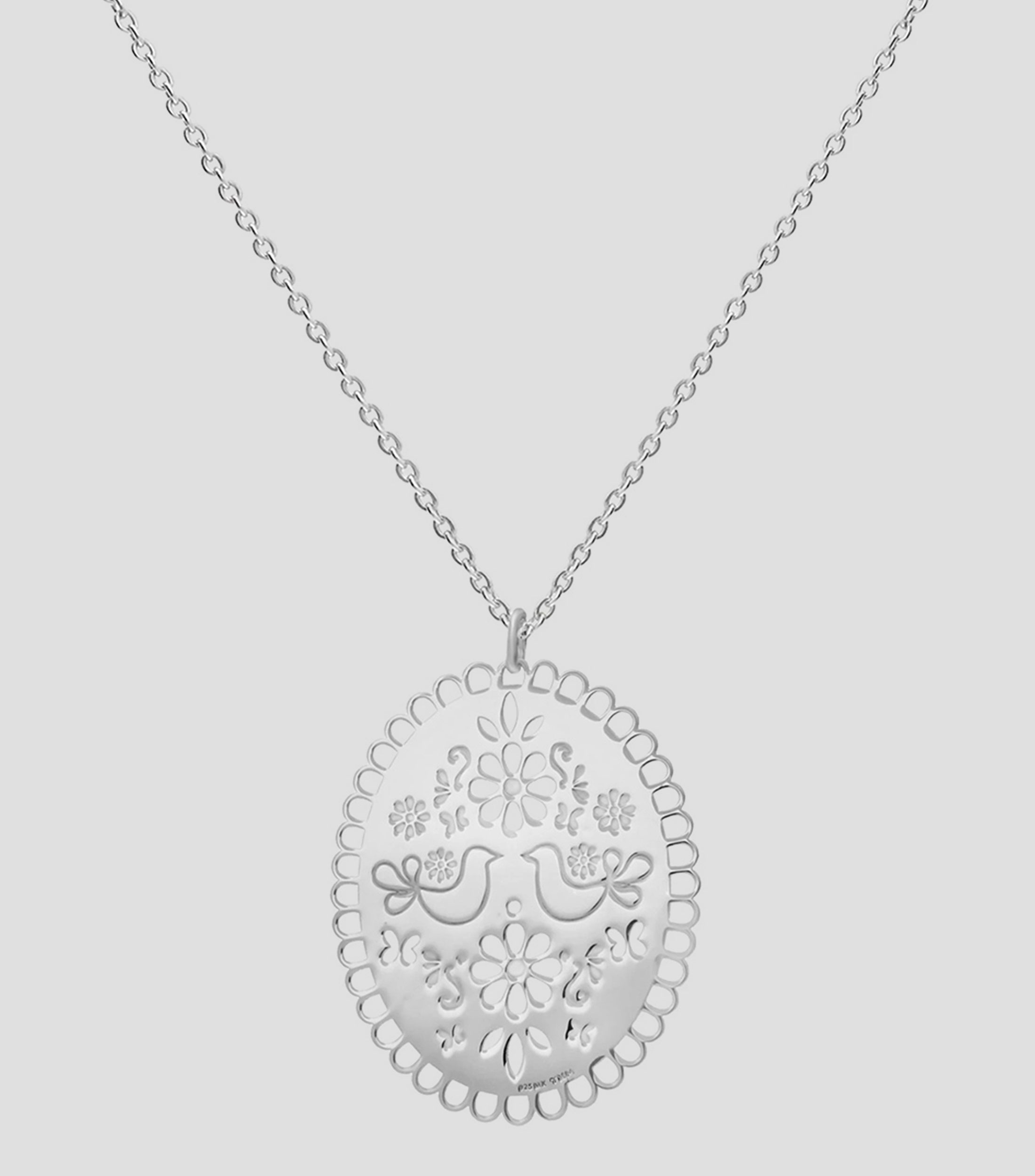 Dije en plata Mujer