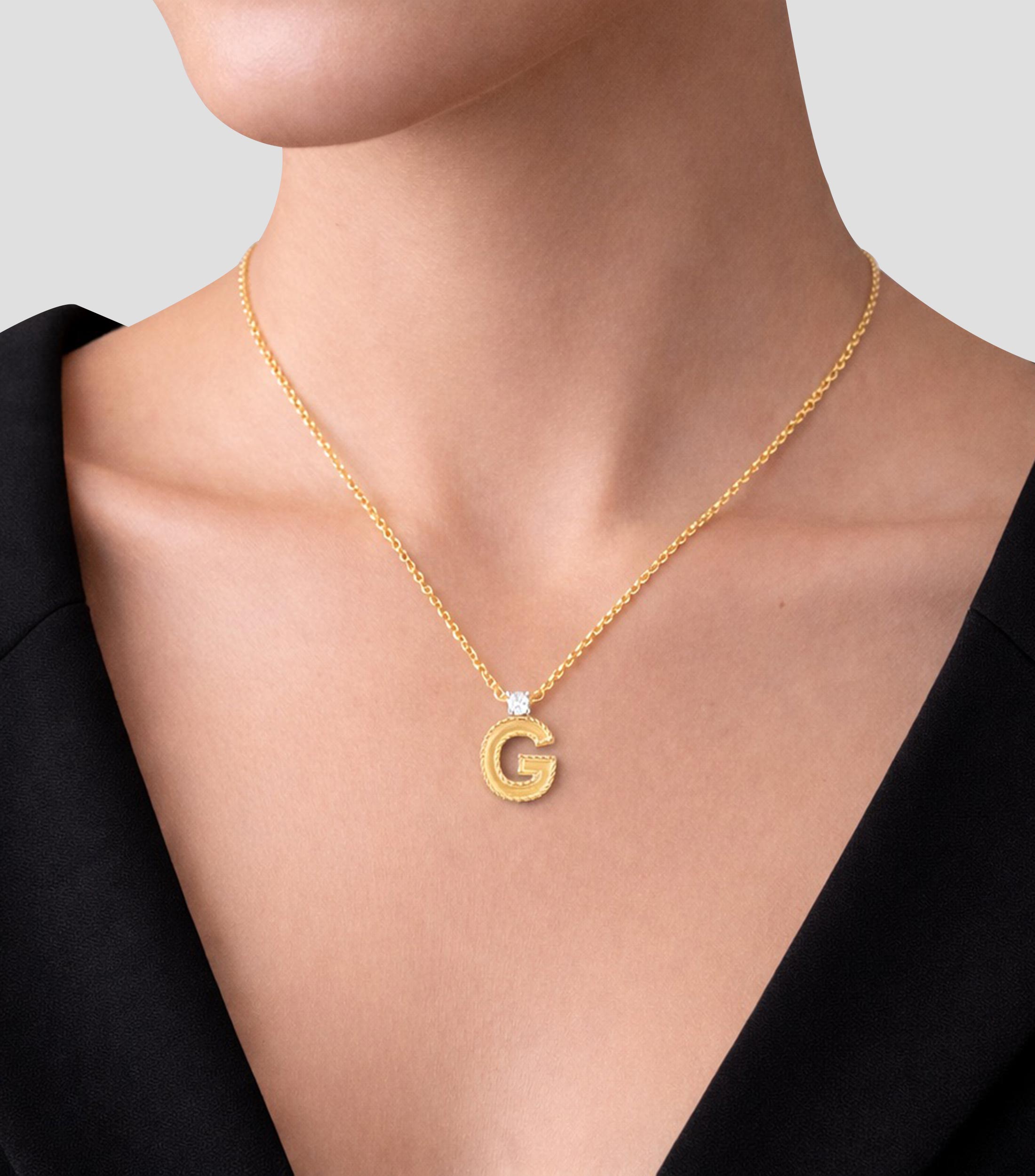 Colgante en Oro 18 Kilates Letter quotGquot con Diamante Mujer