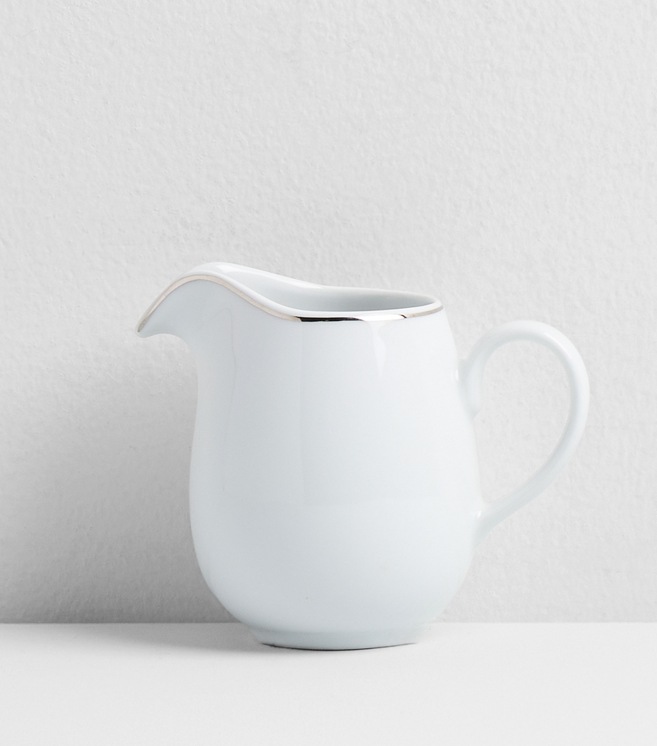 Cremera Bright en porcelana blanca