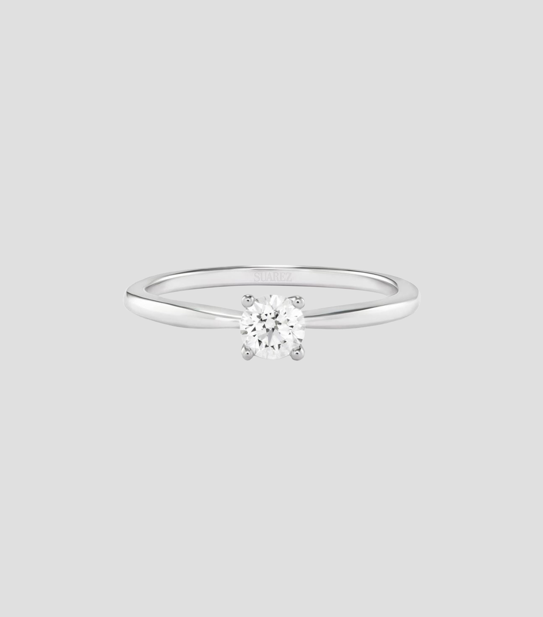 Anillo solitario en Oro blanco de 18 Kilates con diamante Mujer