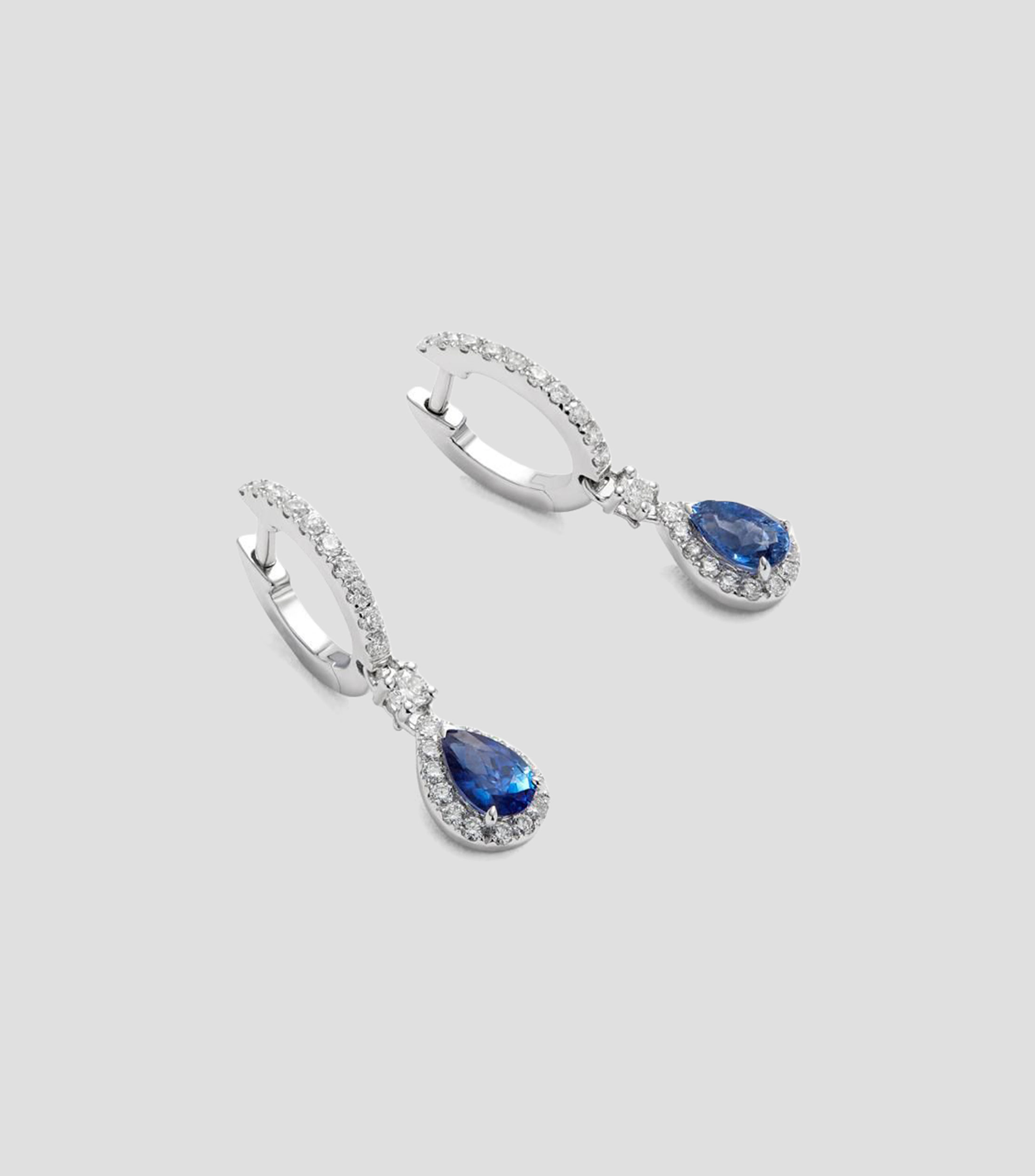 Aretes Oro blanco de 18 Kilates zafiro y diamantes Mujer