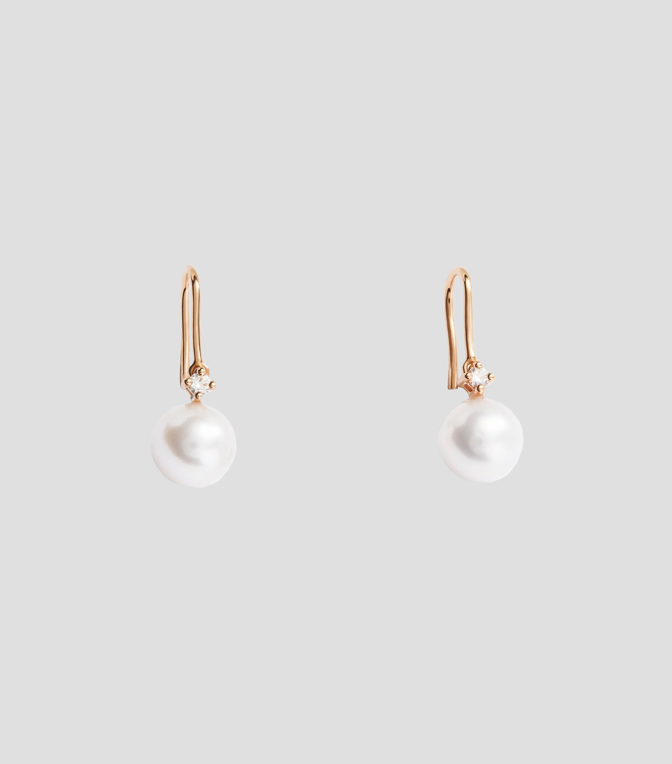 Aretes en Oro rosa de 18 Kilates con perla y diamante Mujer