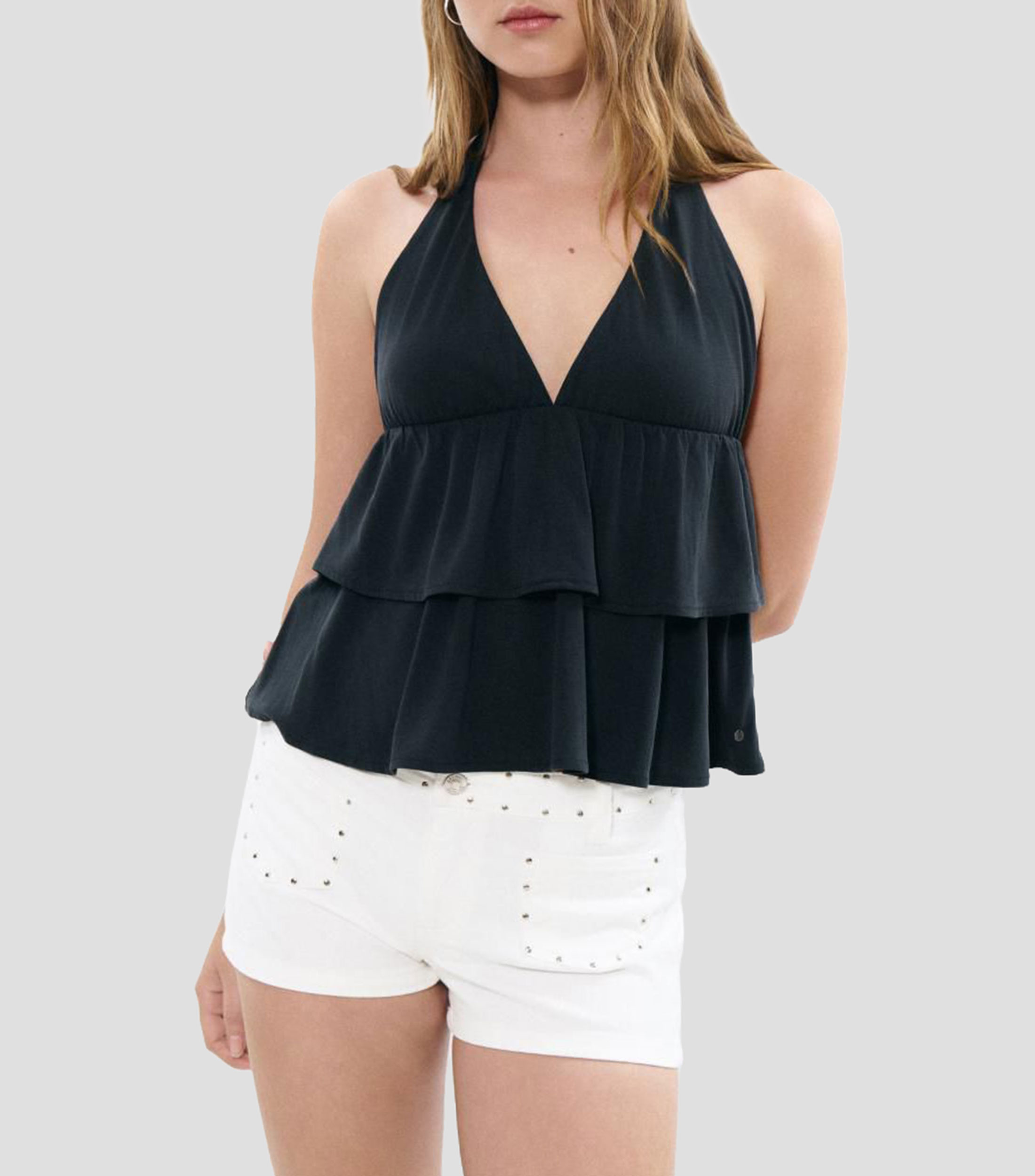 Blusa lisa sin mangas Mujer